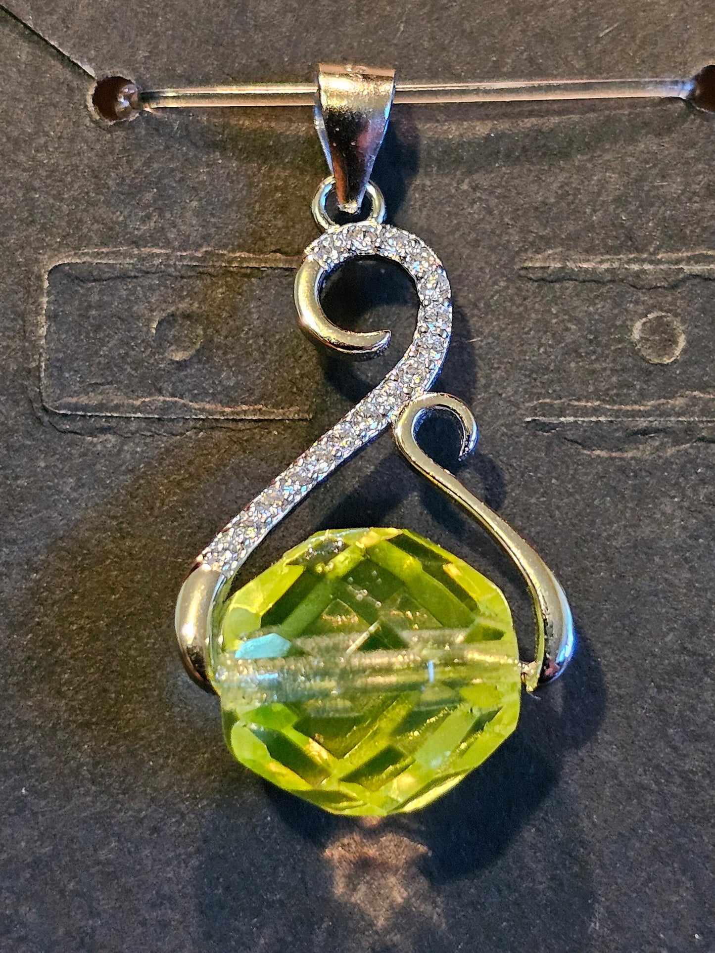 Uranium Glass Pendant in new Sterling Silver with a vintage 12 mm round Uranium Glass bead that glows under black / UV light