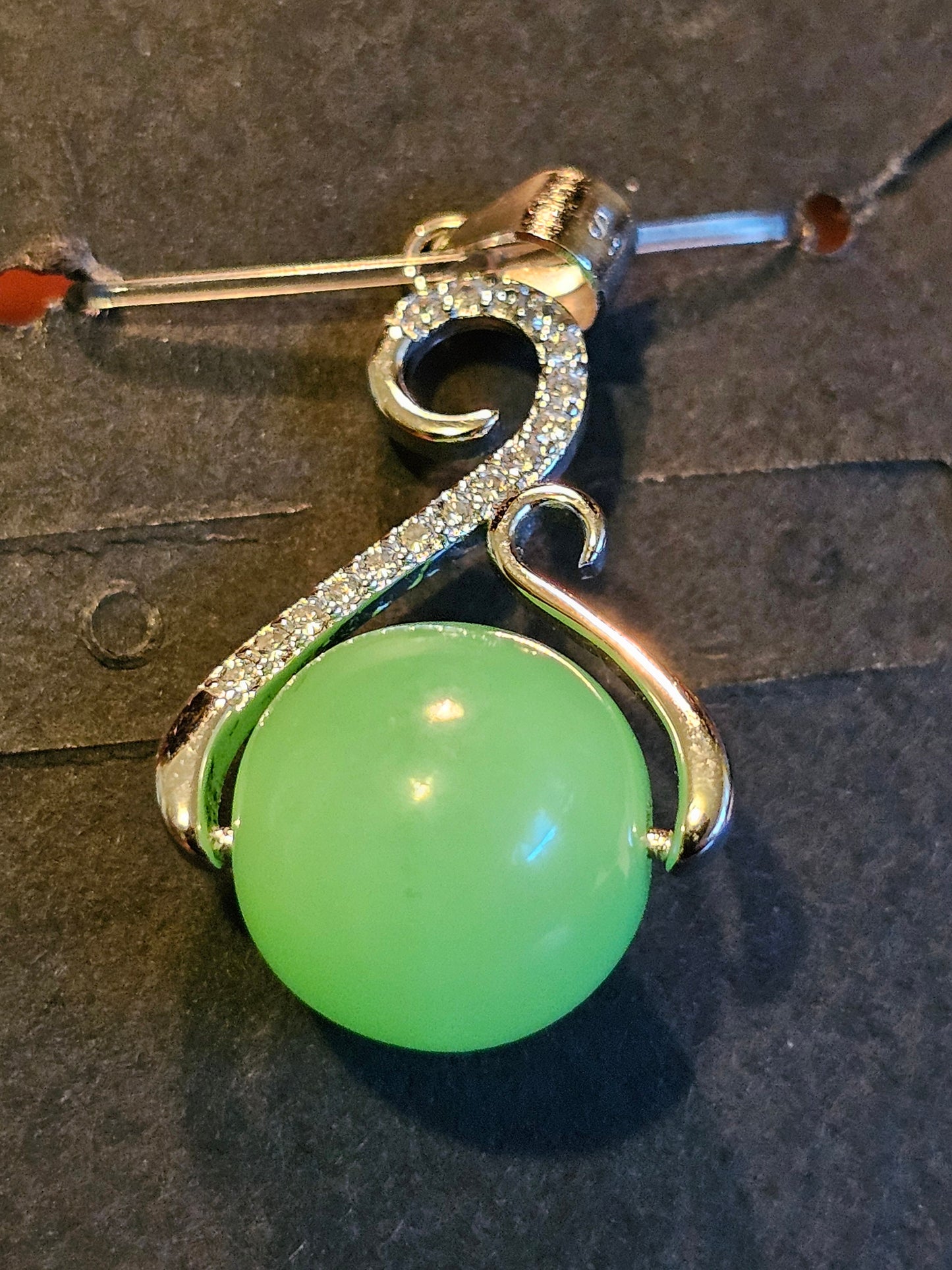 Uranium Glass Pendant in new Sterling Silver with a vintage 12 mm round Uranium Glass bead that glows under black / UV light