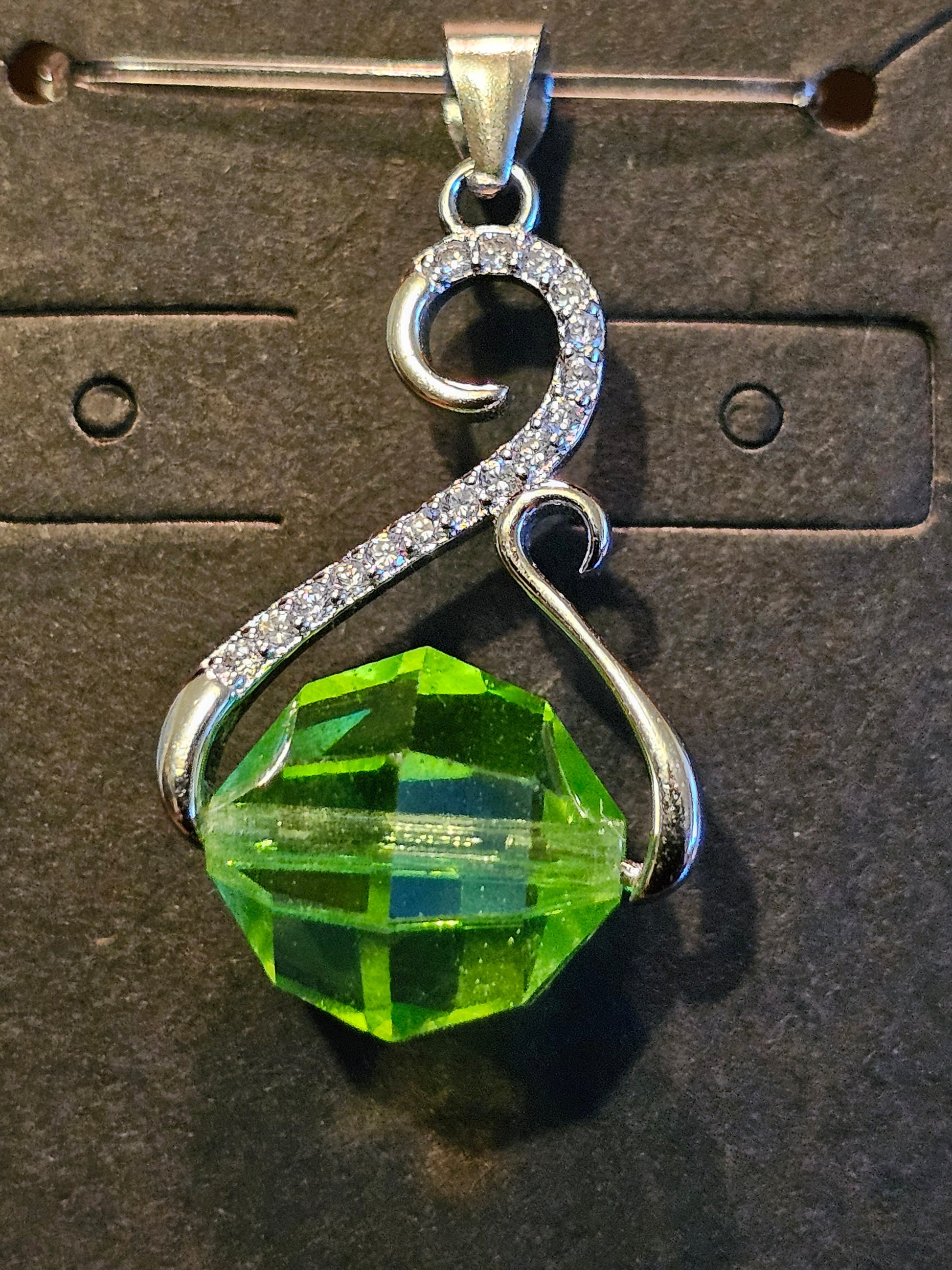 Uranium Glass Pendant in new Sterling Silver with a vintage 12 mm round Uranium Glass bead that glows under black / UV light