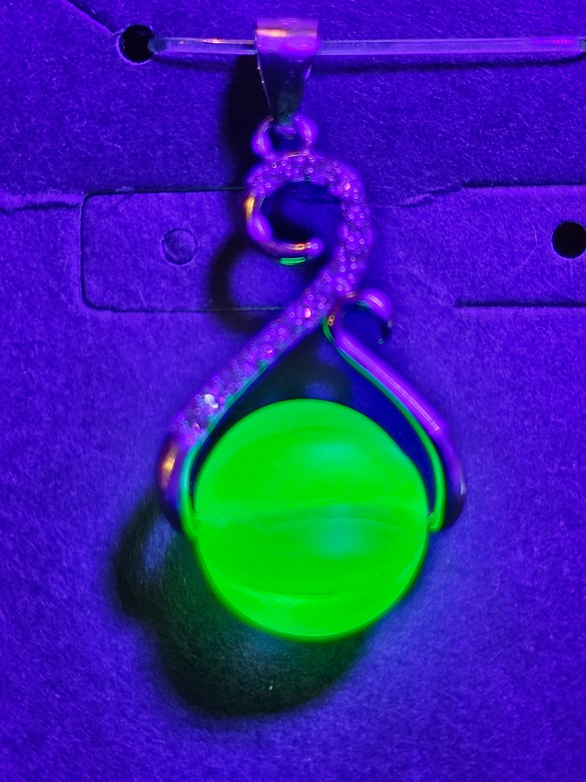 Uranium Glass Pendant in new Sterling Silver with a vintage 12 mm round Uranium Glass bead that glows under black / UV light