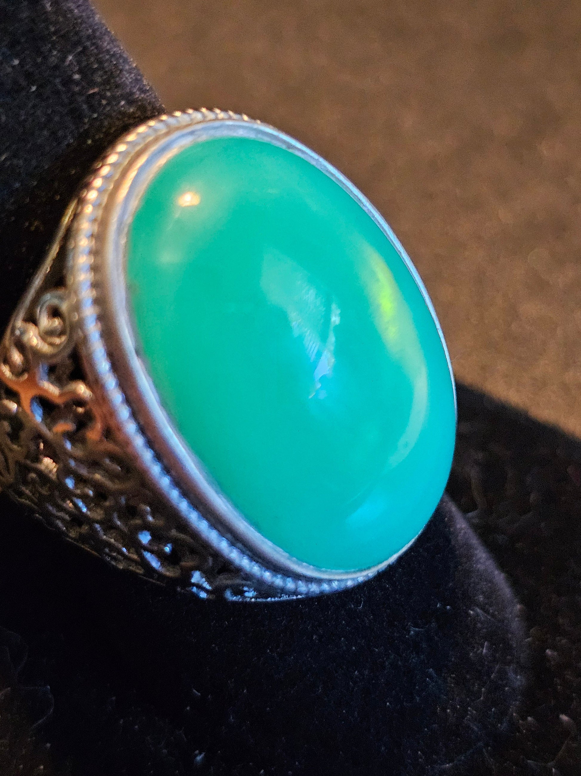 Uranium Glass Men's Ring Adjustable with 25x18 mm vintage Uranium glass Cabochon cut opal colored stone that glows under black / UV light