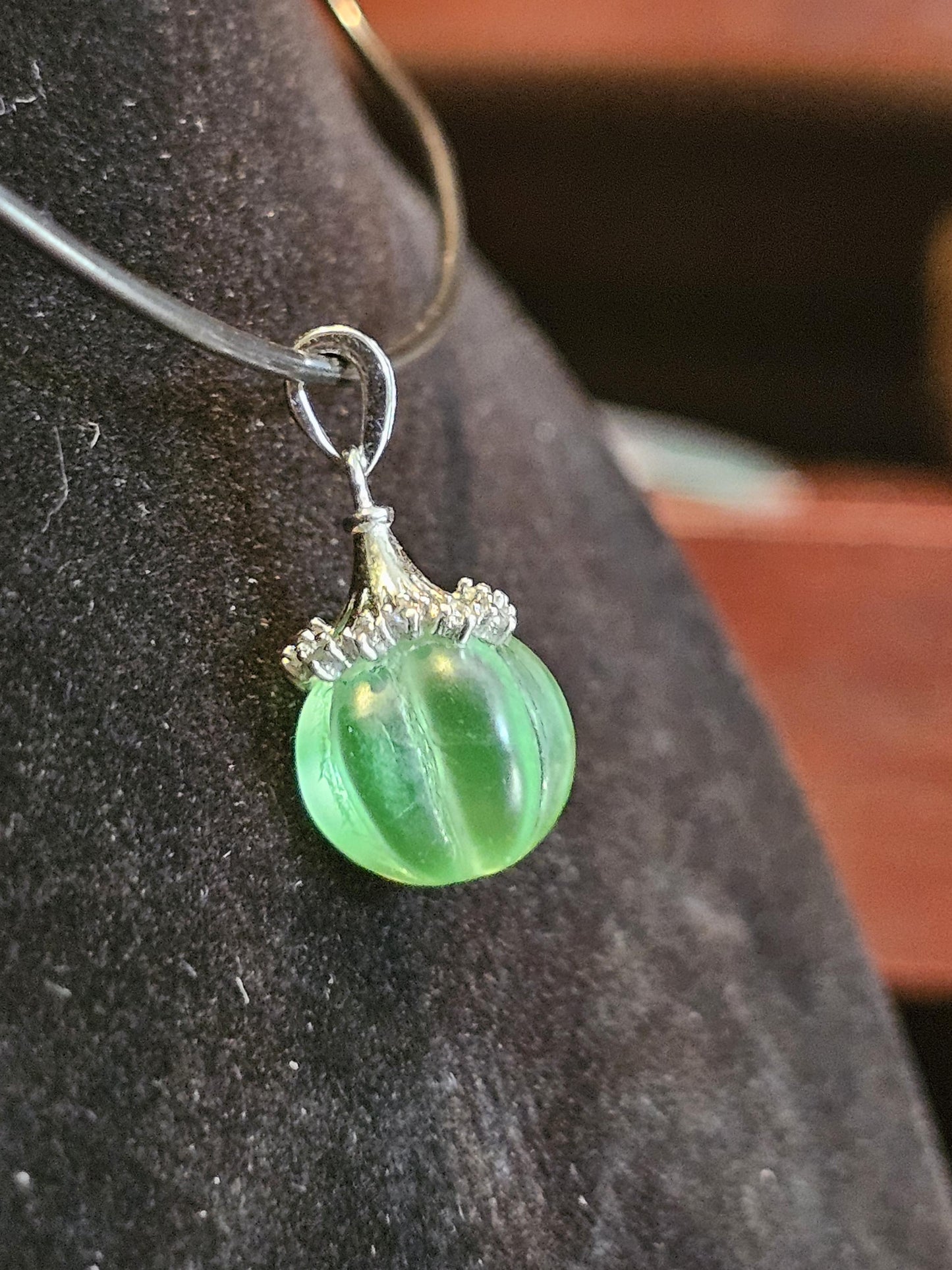 Uranium Glass Pendant in new Sterling Silver with a vintage 12 mm round Uranium Glass bead that glows under black / UV light