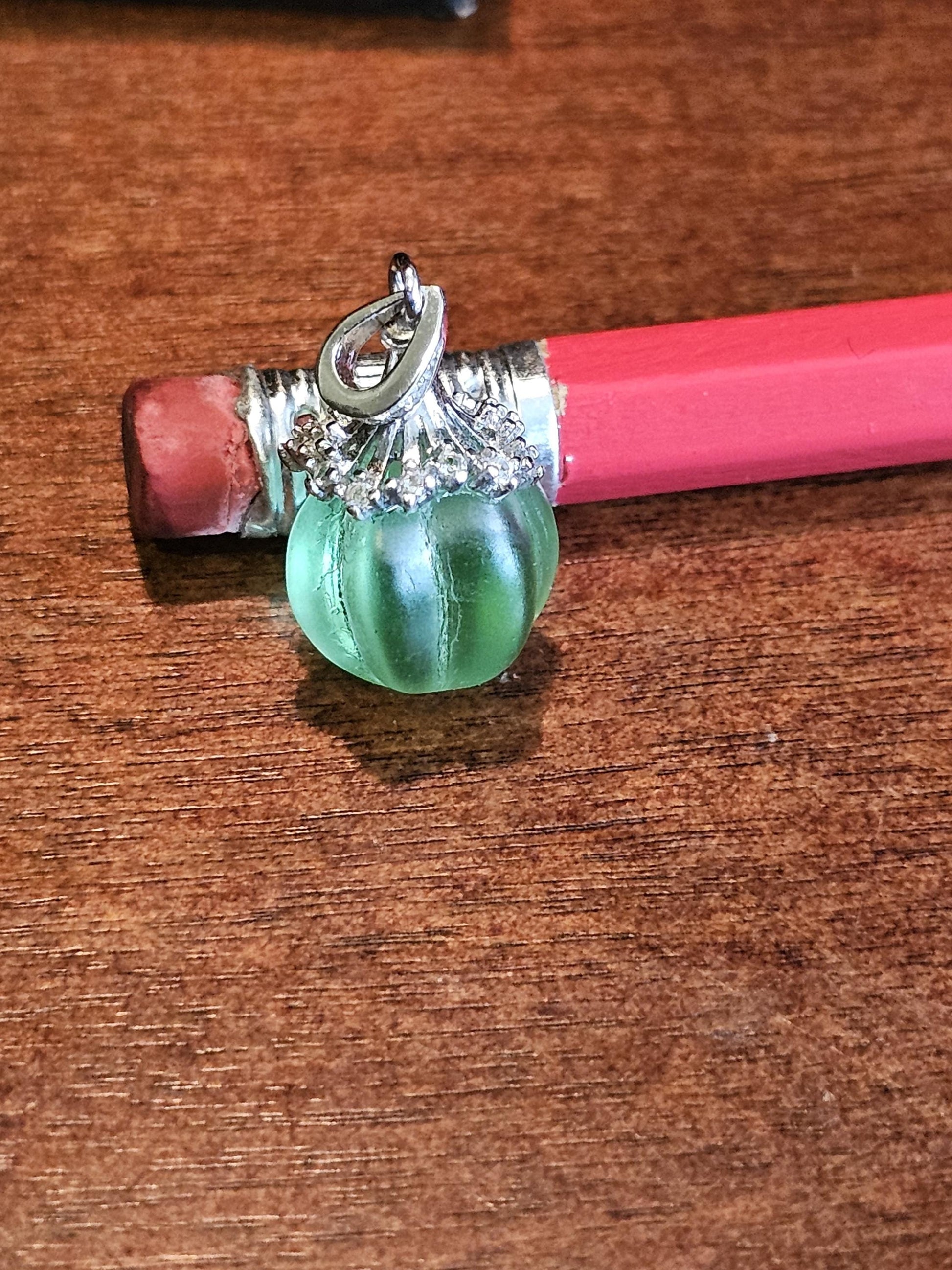Uranium Glass Pendant in new Sterling Silver with a vintage 12 mm round Uranium Glass bead that glows under black / UV light