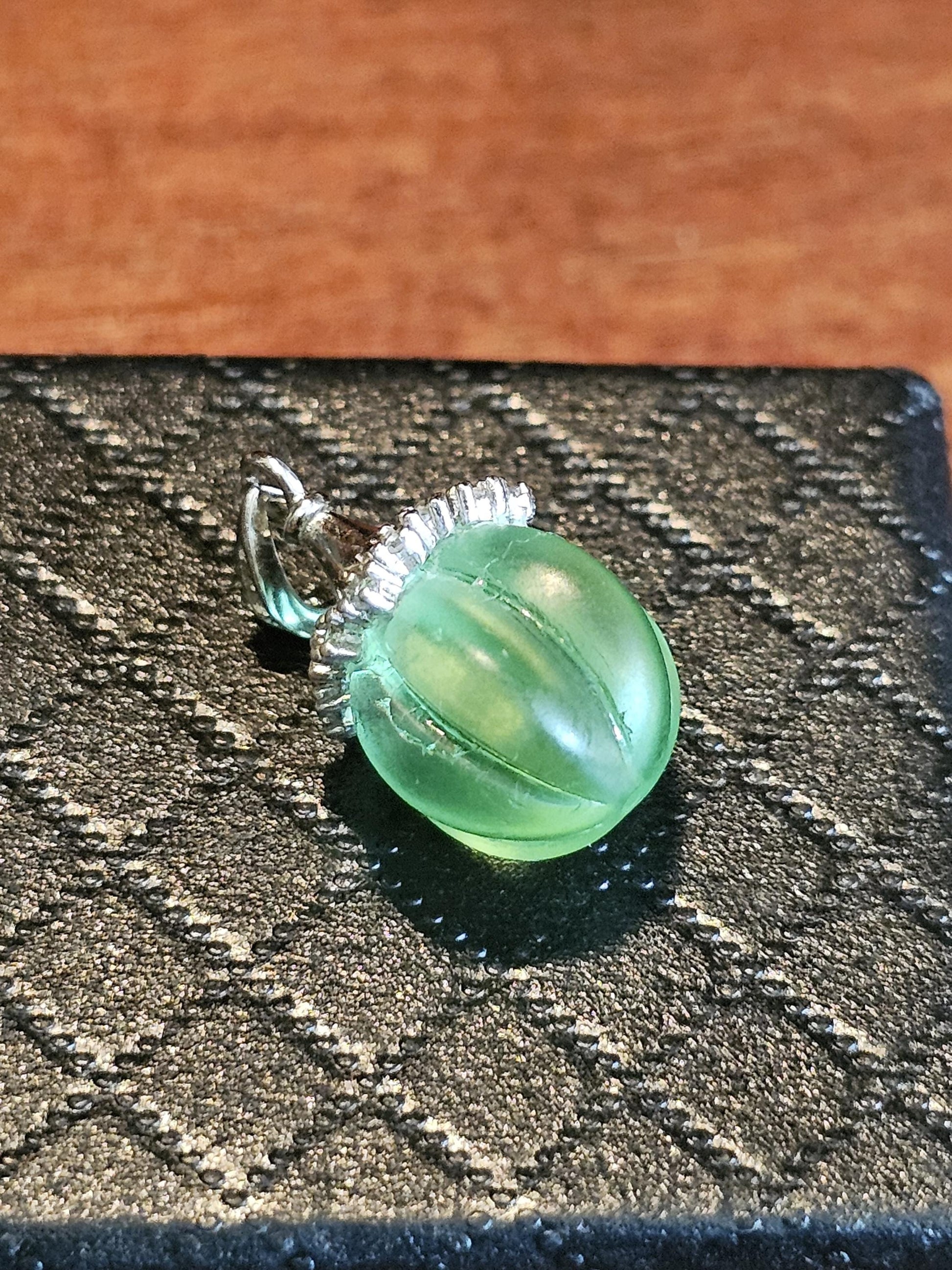 Uranium Glass Pendant in new Sterling Silver with a vintage 12 mm round Uranium Glass bead that glows under black / UV light