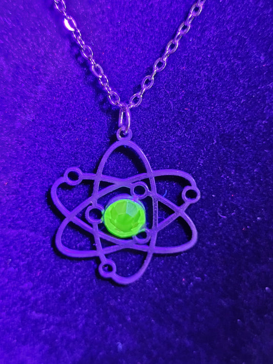 Uranium Glass Pendant in Stainless Steel setting with vintage 6 mm Round cut Cabochon Uranium Glass stone that glows under black / UV light