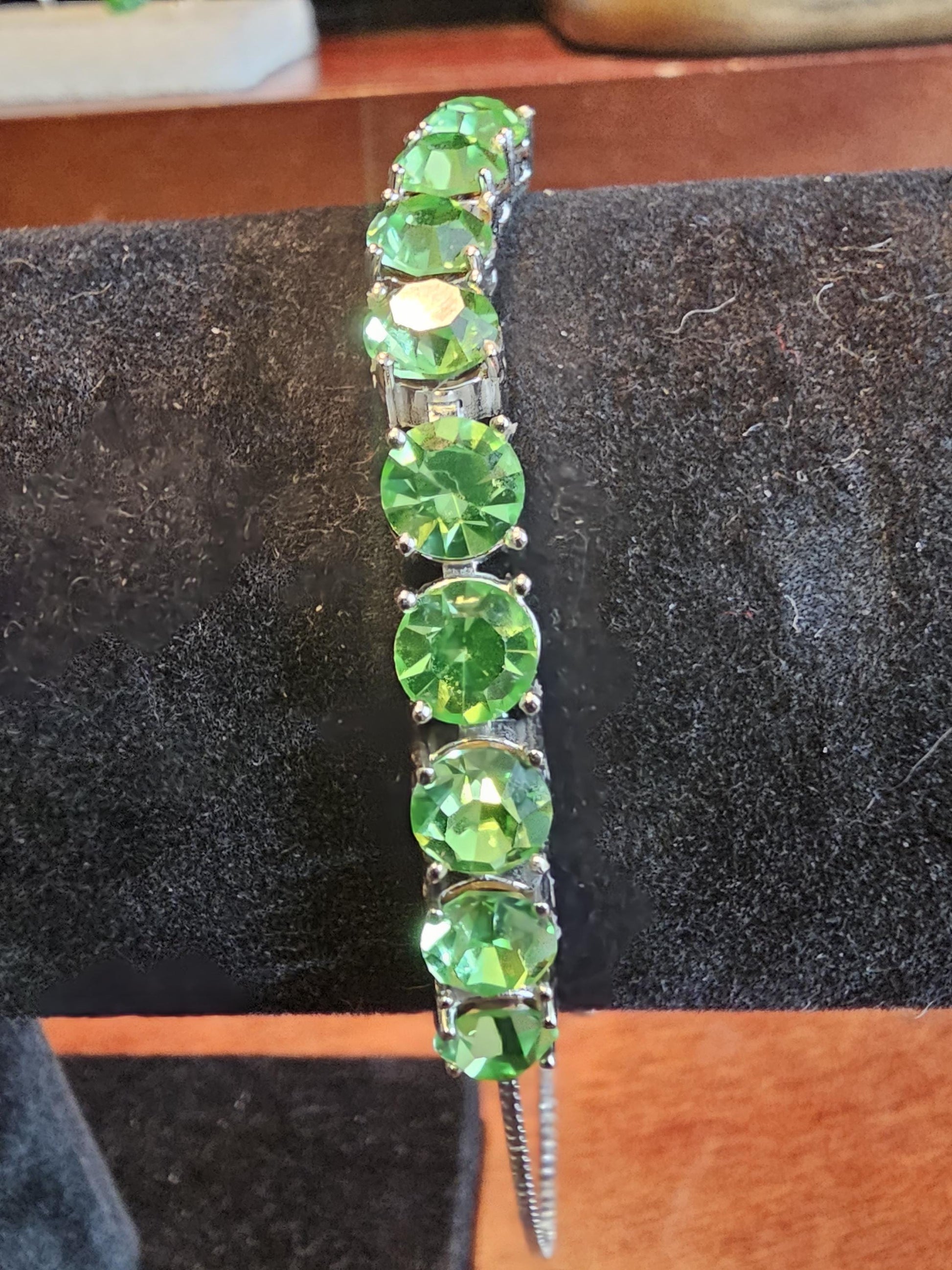 Uranium Glass Bracelet new Sterling Silver with 9 vintage Uranium glass Round cut stones in 6 mm that glow under black / UV light.