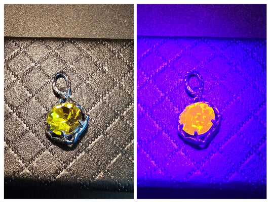 Cadmium Glass Pendant in new Sterling Silver with a vintage 8 mm Round cut Cadmium Glass stone that glows Orange under black / UV light