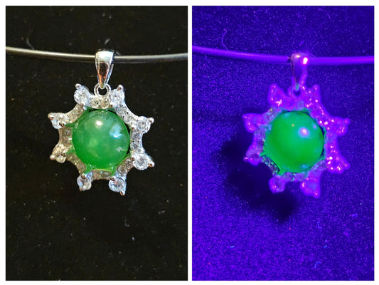 Uranium Glass pendant, with a vintage dark Green Round top Uranium glass stone that glows under black light mounted in new sterling silver