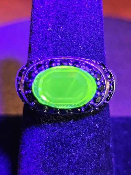 Uranium Glass Oval cut Ring  with black Spindle accent stones, and a vintage Uranium glass 12x8 mm  stone that glows under black / UV light