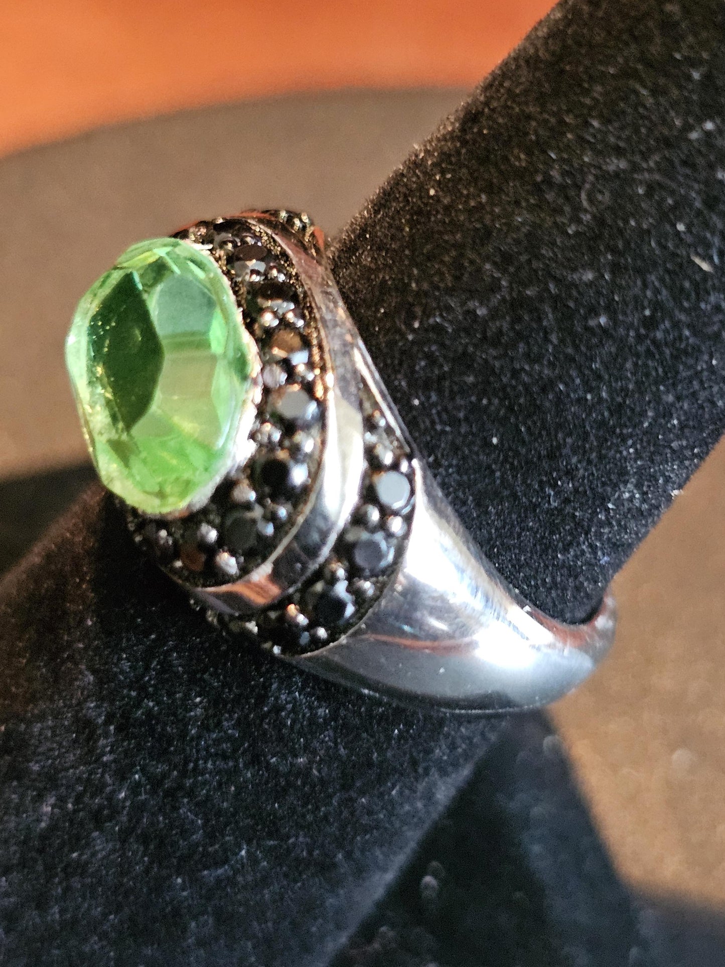Uranium Glass Oval cut Ring  with black Spindle accent stones, and a vintage Uranium glass 12x8 mm  stone that glows under black / UV light