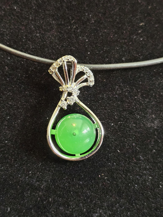 Uranium Glass pendant, new Sterling Silver with a vintage rare dark Green Round top Uranium glass stone that glows under black light