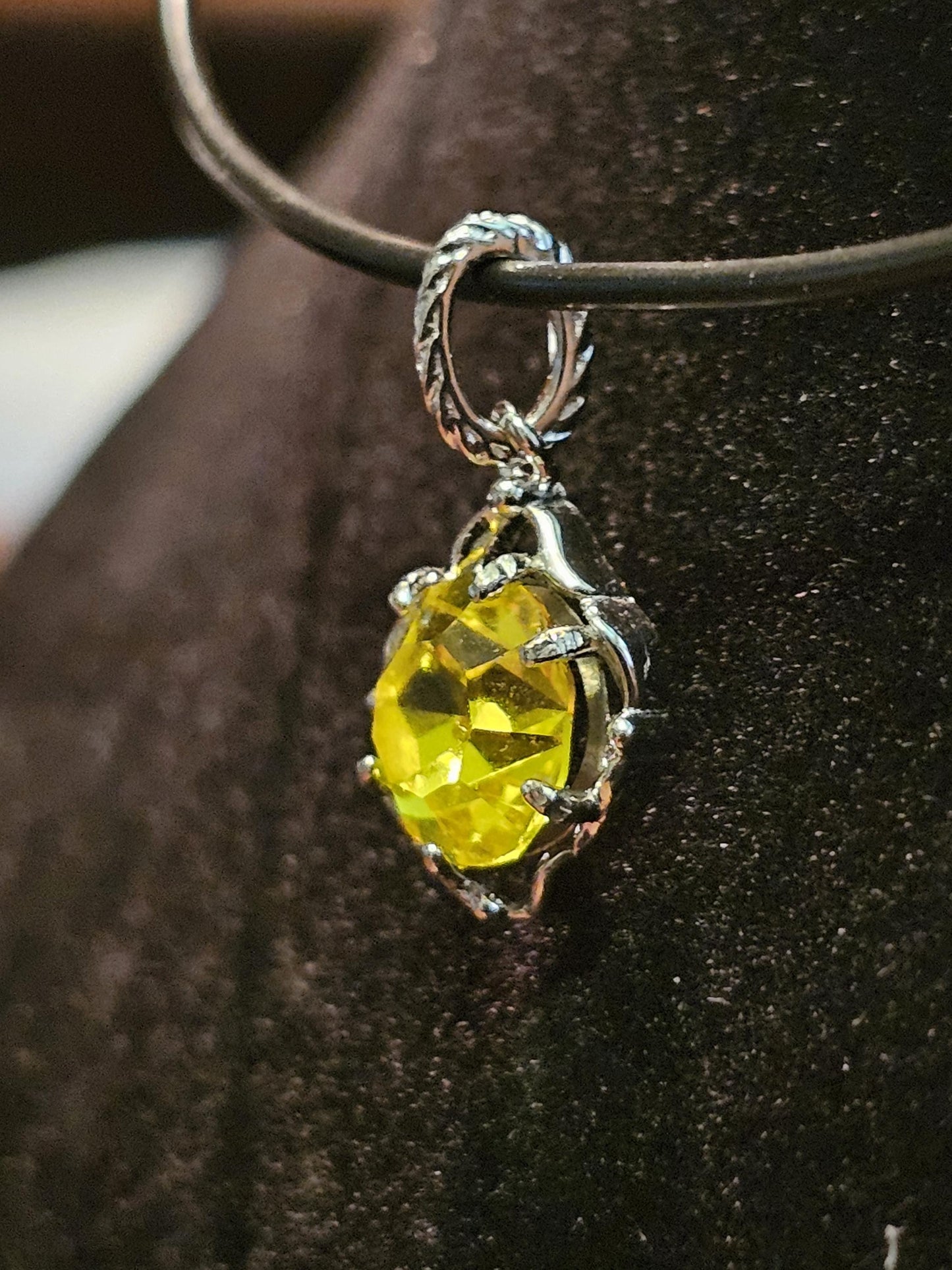 Cadmium Glass Pendant in new Sterling Silver with a vintage 8 mm Round cut Cadmium Glass stone that glows Orange under black / UV light