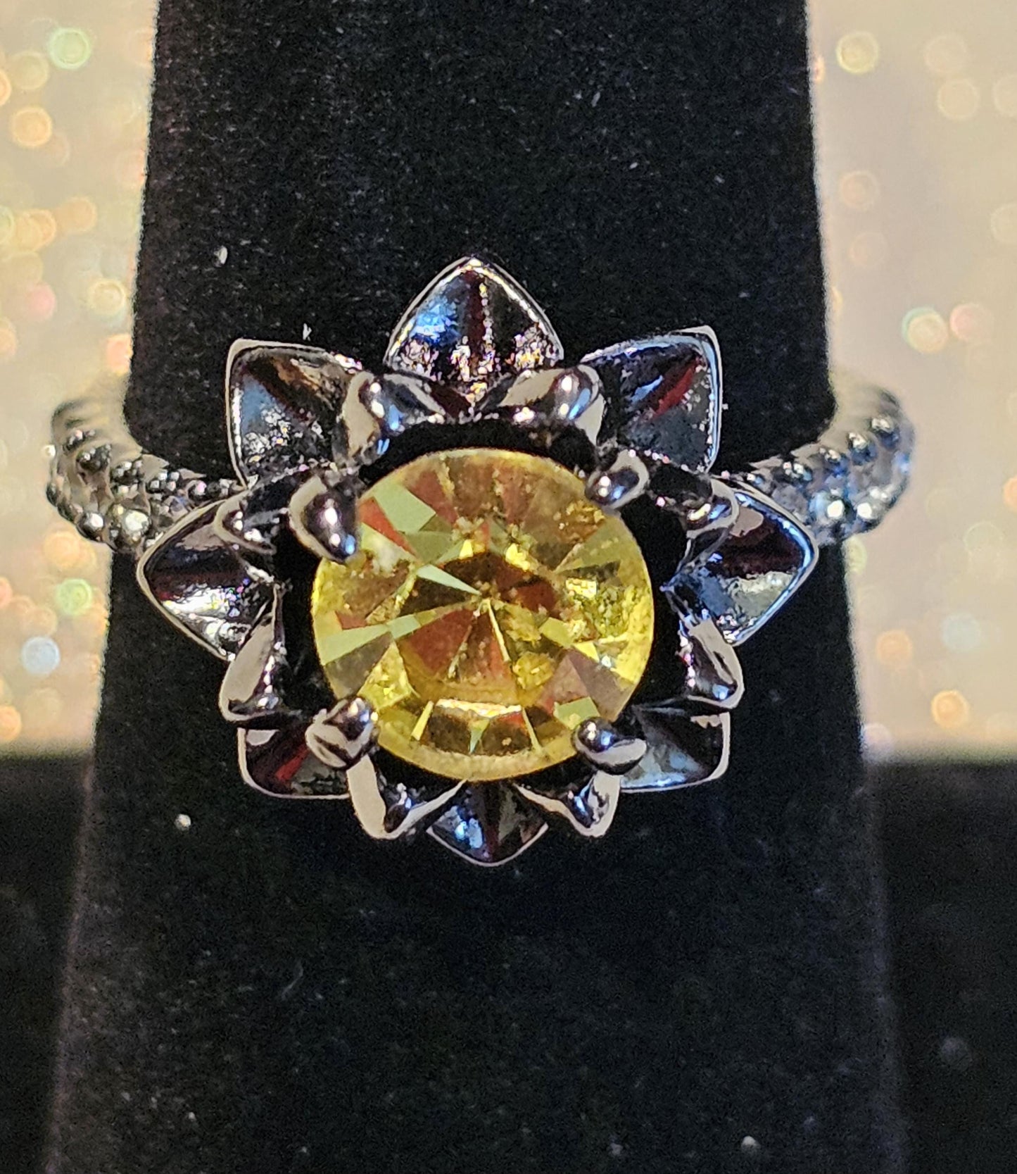 Cadmium Glass Round cut flower ring new Black plated size 6, 7, or 8 with vintage 7 mm Cadmium glass stone that glows under black / UV light