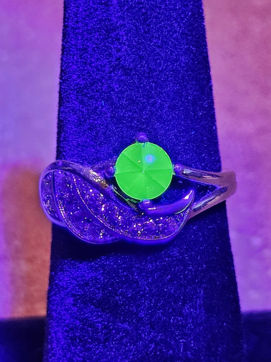 Uranium Glass Round cut Ring in size 6.  New Silver plated with a vintage 5mm Uranium glass stone that glows under black/UV light