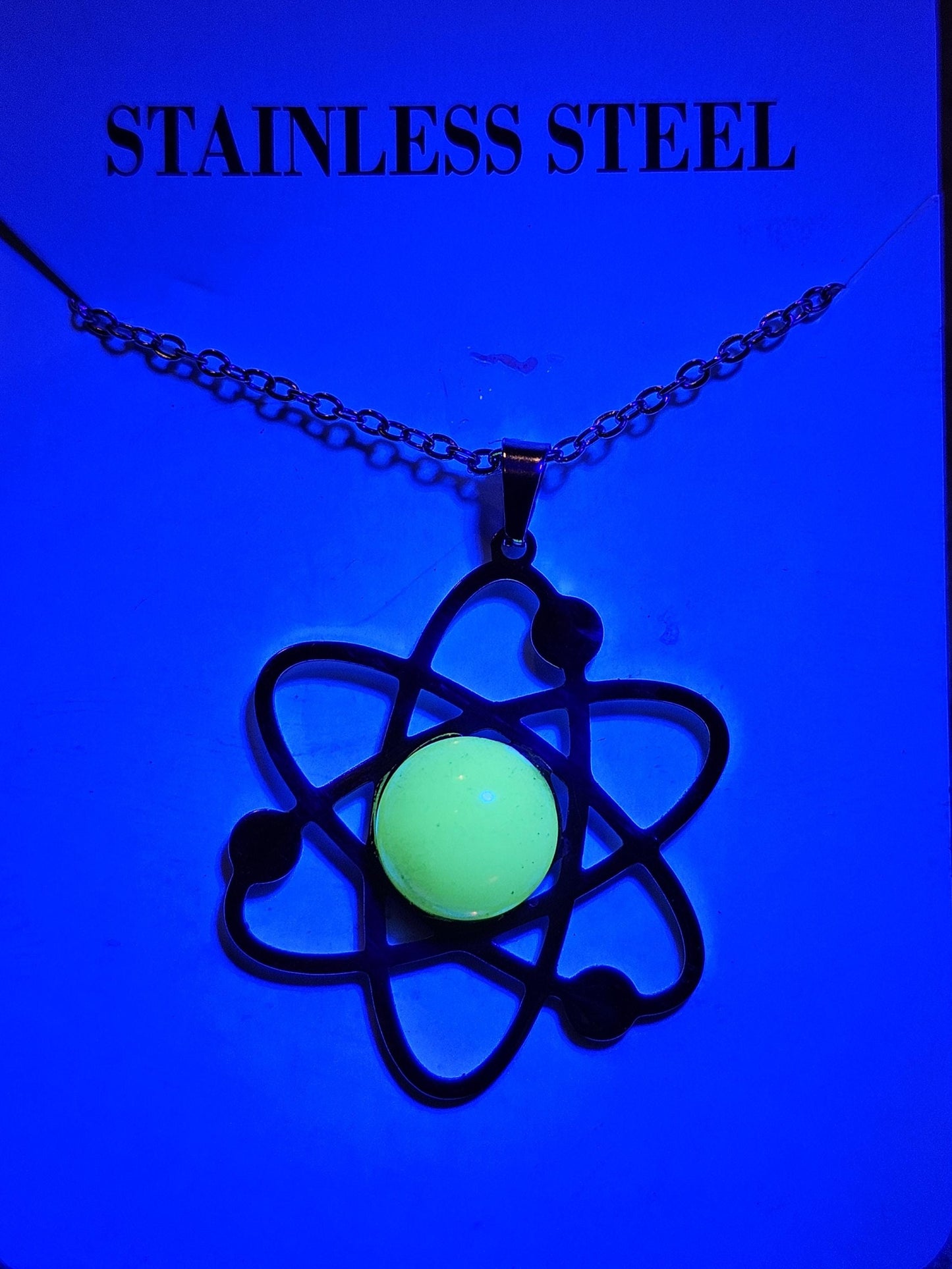 Uranium Glass Pendant in Stainless Steel setting with vintage 11 mm Round cut Cabochon Uranium Glass stone that glows under black / UV light
