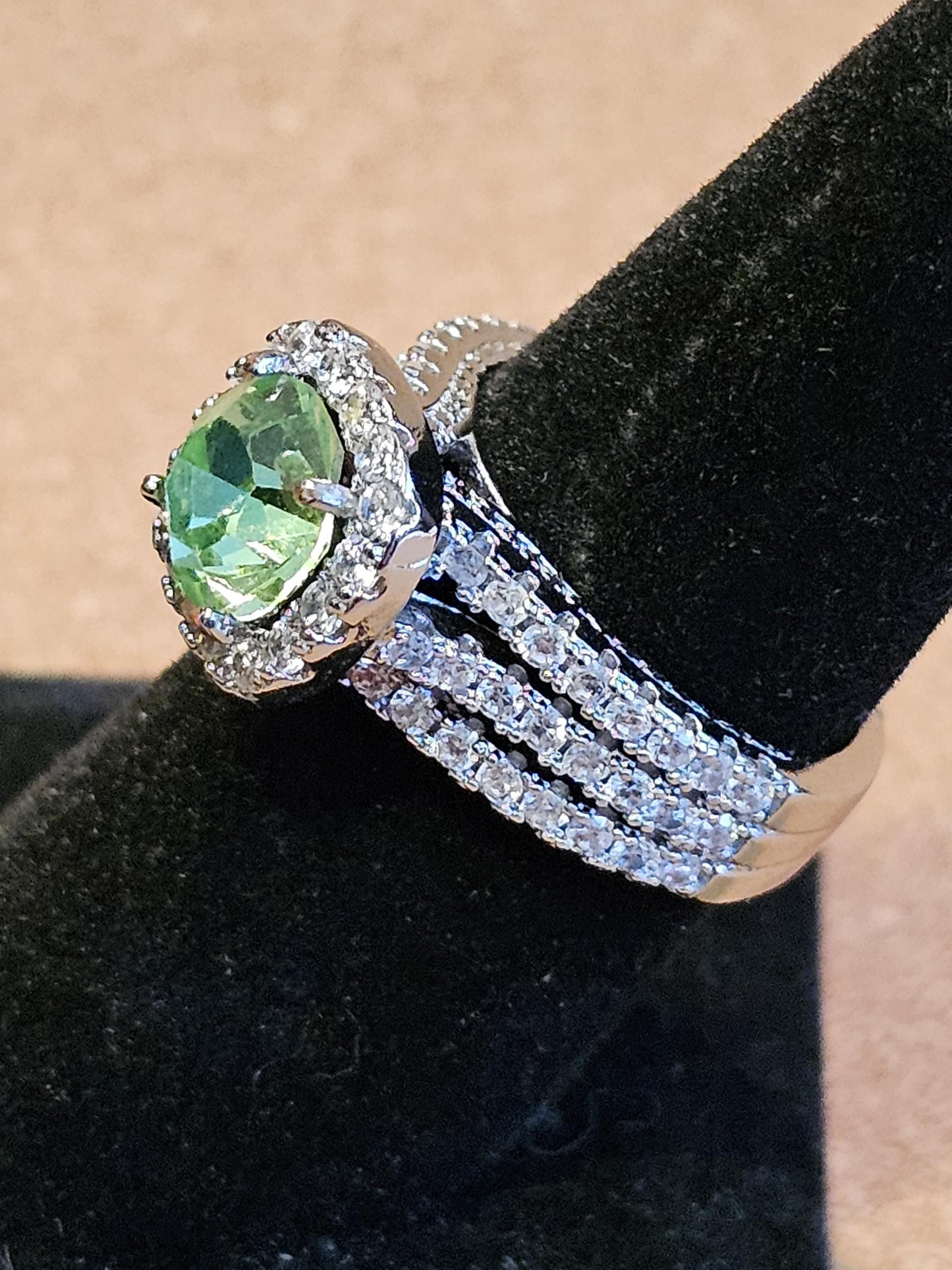 Uranium Glass Round cut Ring in size 7.  New Silver plated with a vintage 8mm Uranium glass stone that glows under black/UV light