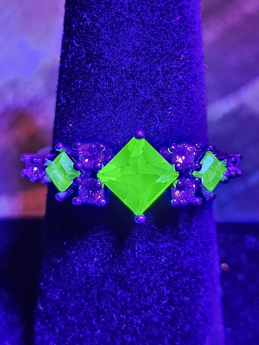 Uranium Glass Ring Princess cut 8 accent stones and 3 vintage Uranium glass stones that glow under black/UV light. Sterling Silver size 7