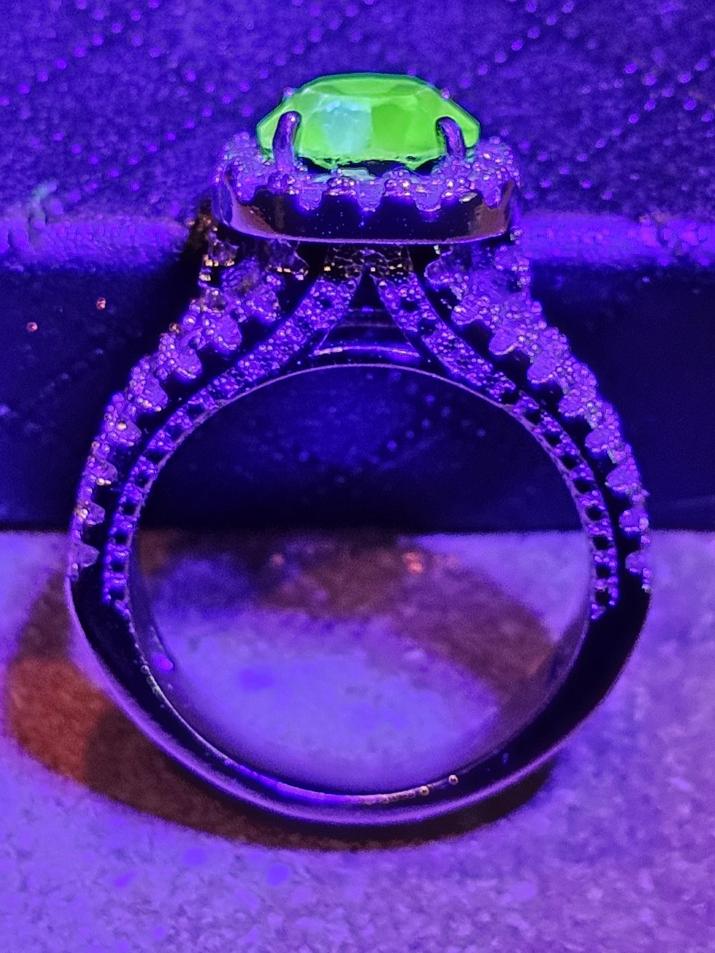 Uranium Glass Round cut Ring in size 7.  New Silver plated with a vintage 8mm Uranium glass stone that glows under black/UV light