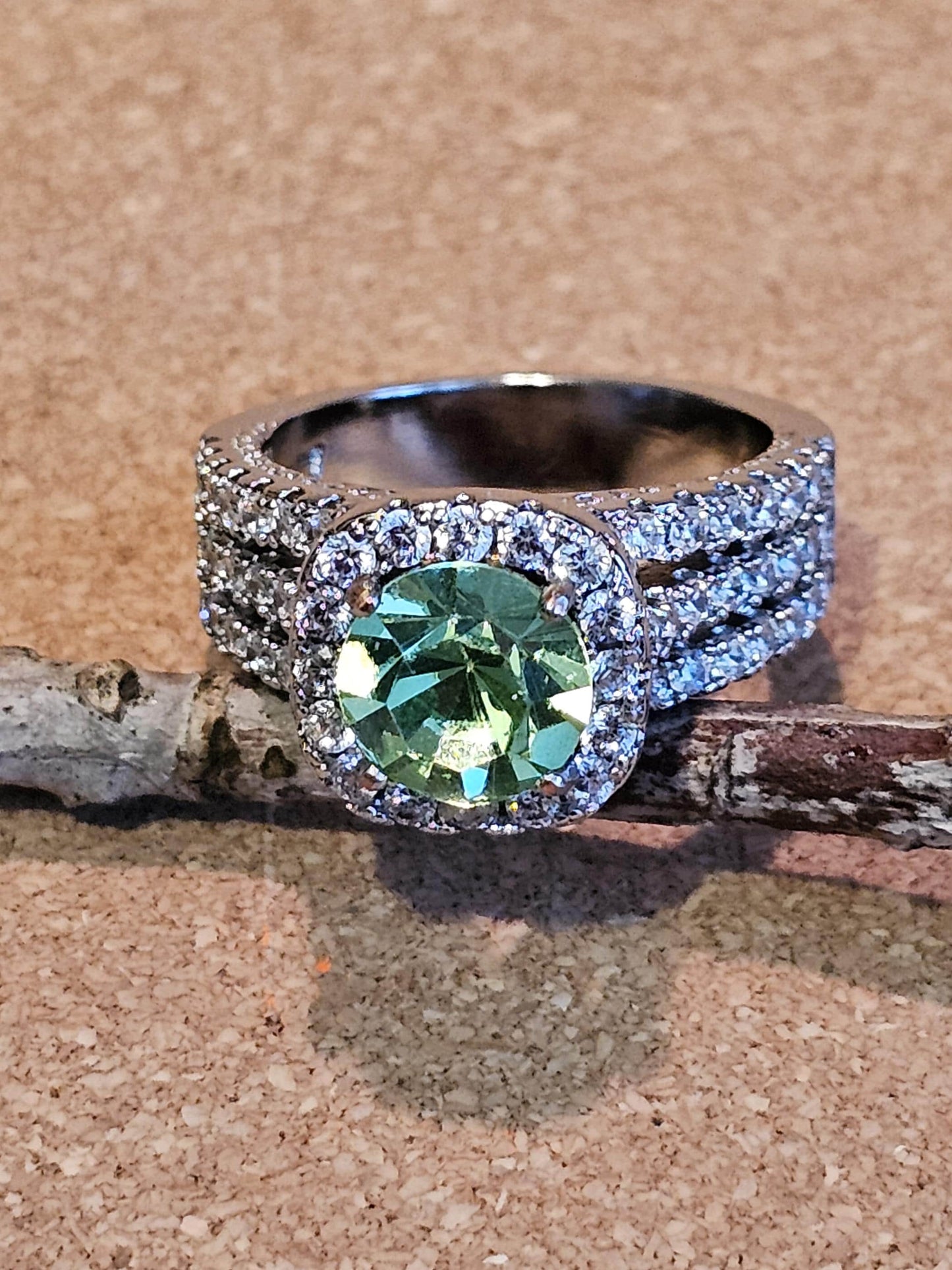 Uranium Glass Round cut Ring in size 7.  New Silver plated with a vintage 8mm Uranium glass stone that glows under black/UV light