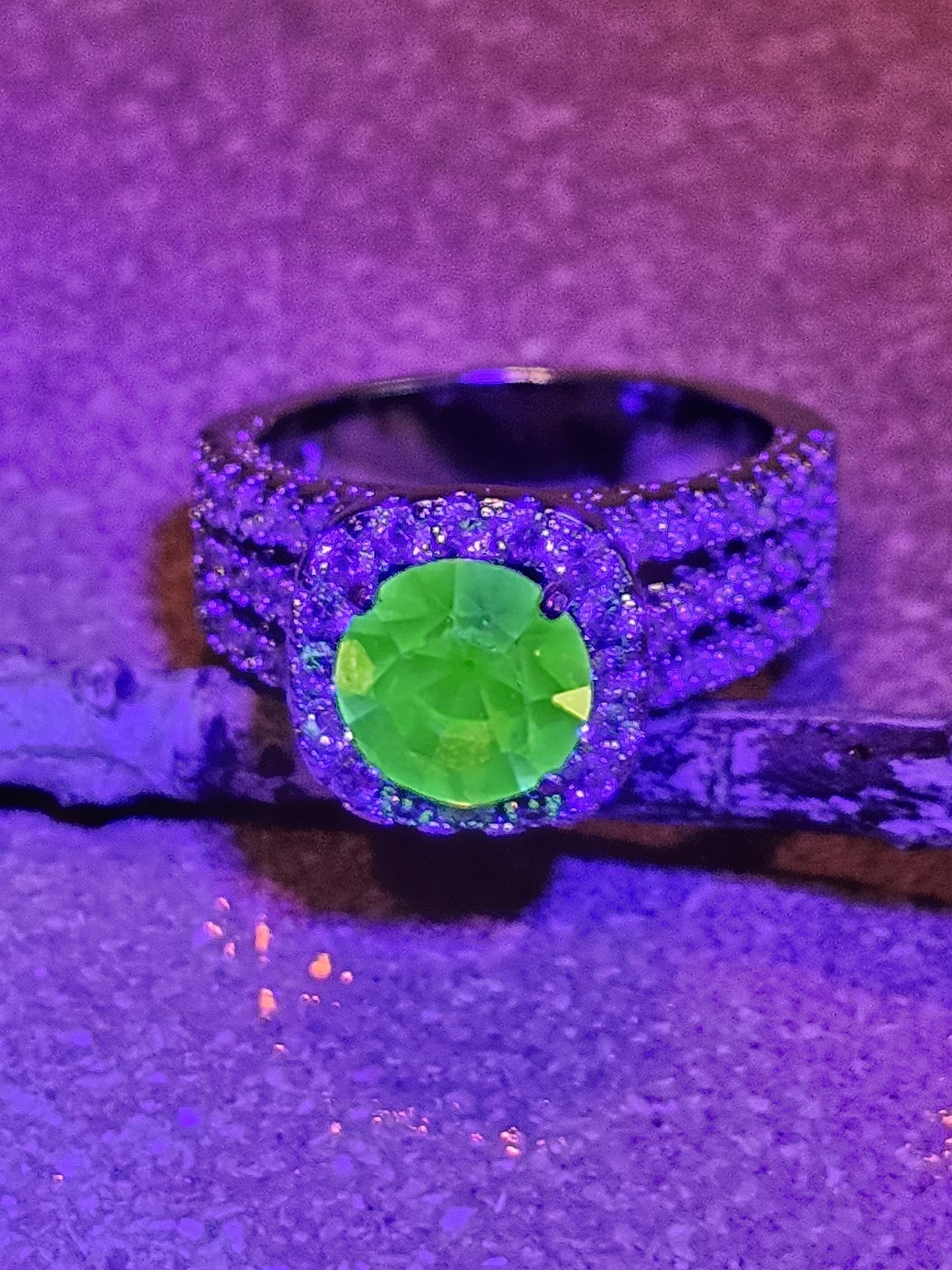 Uranium Glass Round cut Ring in size 7.  New Silver plated with a vintage 8mm Uranium glass stone that glows under black/UV light