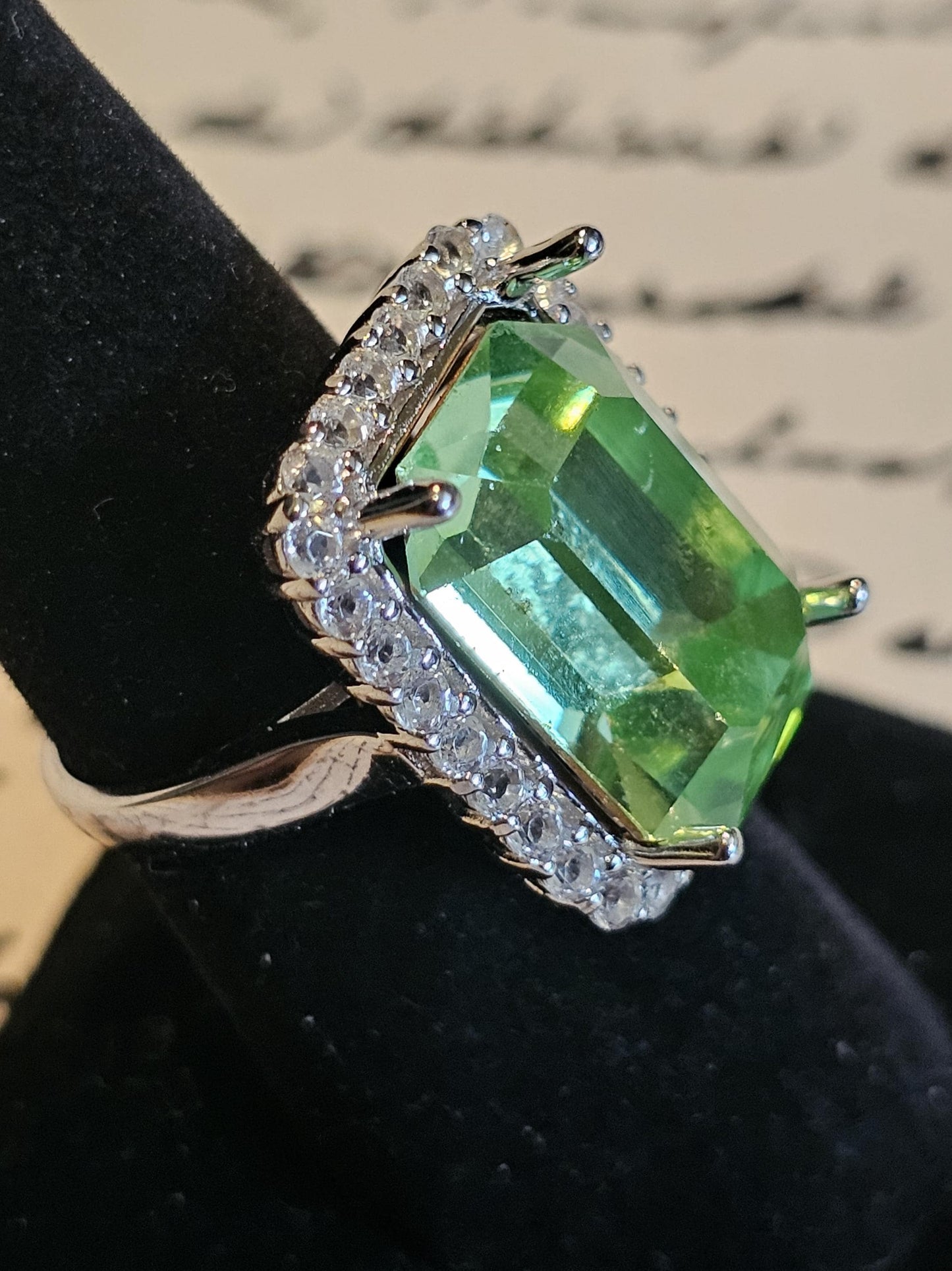 Uranium Glass Emerald cut Halo style ring in size 7, new Sterling Silver with vintage Uranium glass stone that glows under black / UV light