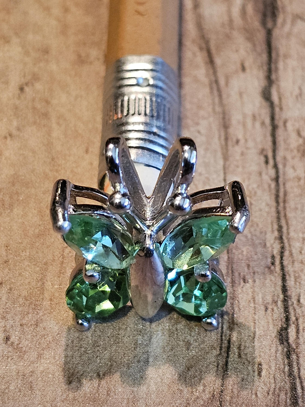 Uranium Glass Pendant in new Sterling Silver Butterfly design with Vintage Uranium Glass stones that glow under black / UV light