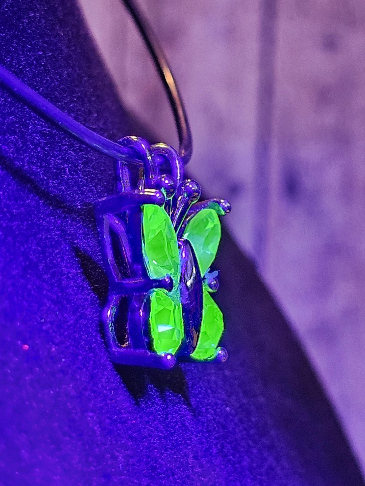 Uranium Glass Pendant in new Sterling Silver Butterfly design with Vintage Uranium Glass stones that glow under black / UV light