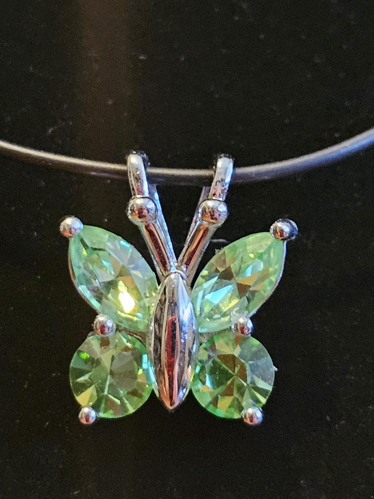 Uranium Glass Pendant in new Sterling Silver Butterfly design with Vintage Uranium Glass stones that glow under black / UV light