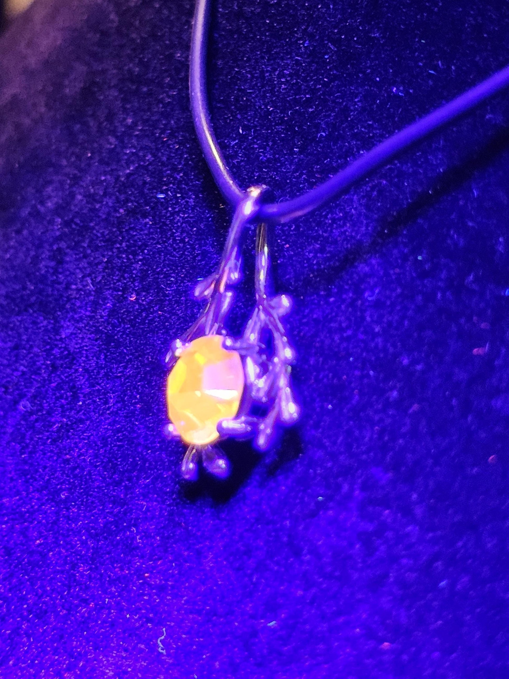 Cadmium Glass Pendant in new Sterling Silver with a vintage Round cut 7 mm Cadmium glass stone that glows under black / UV light