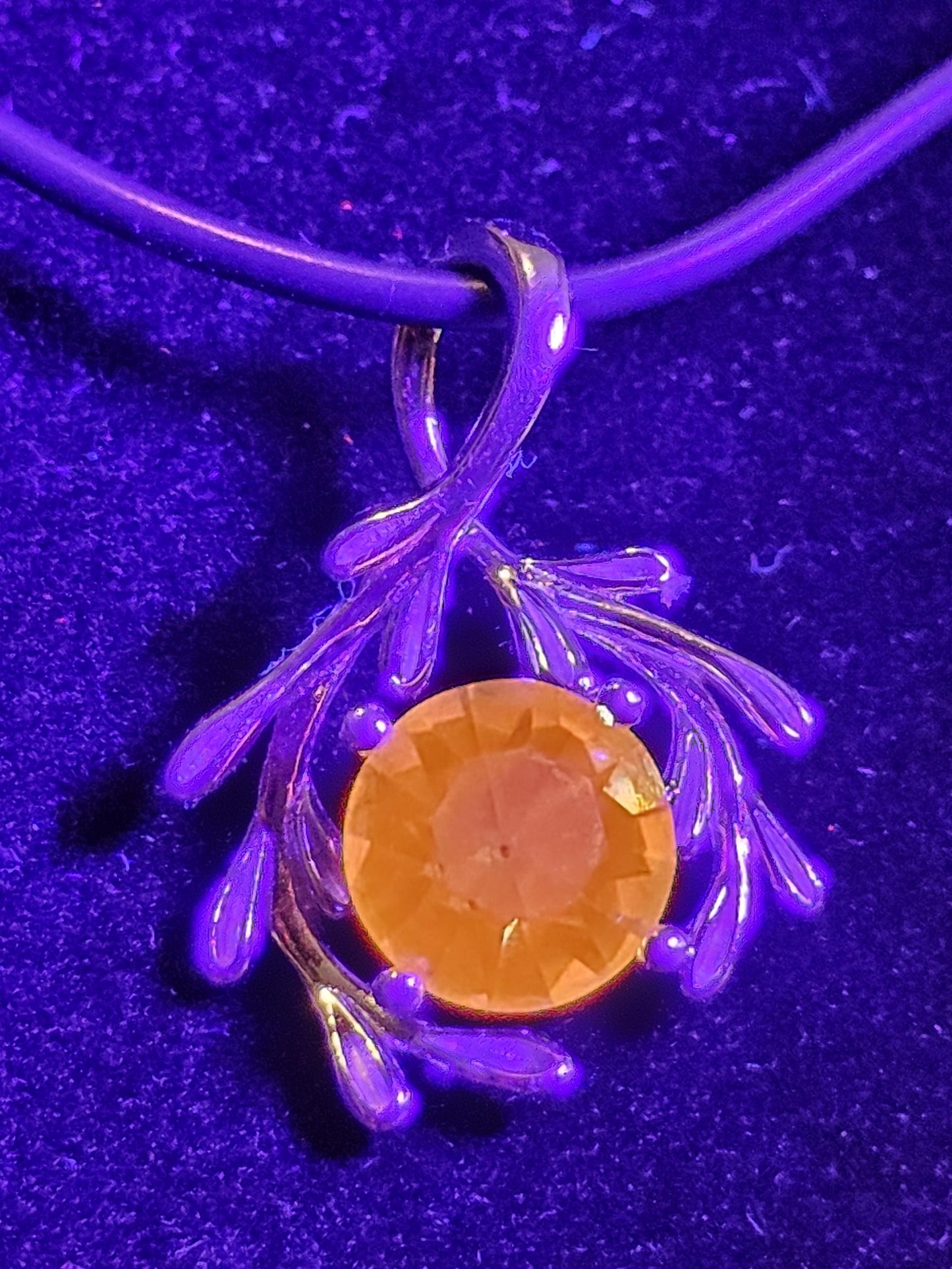 Cadmium Glass Pendant in new Sterling Silver with a vintage Round cut 7 mm Cadmium glass stone that glows under black / UV light