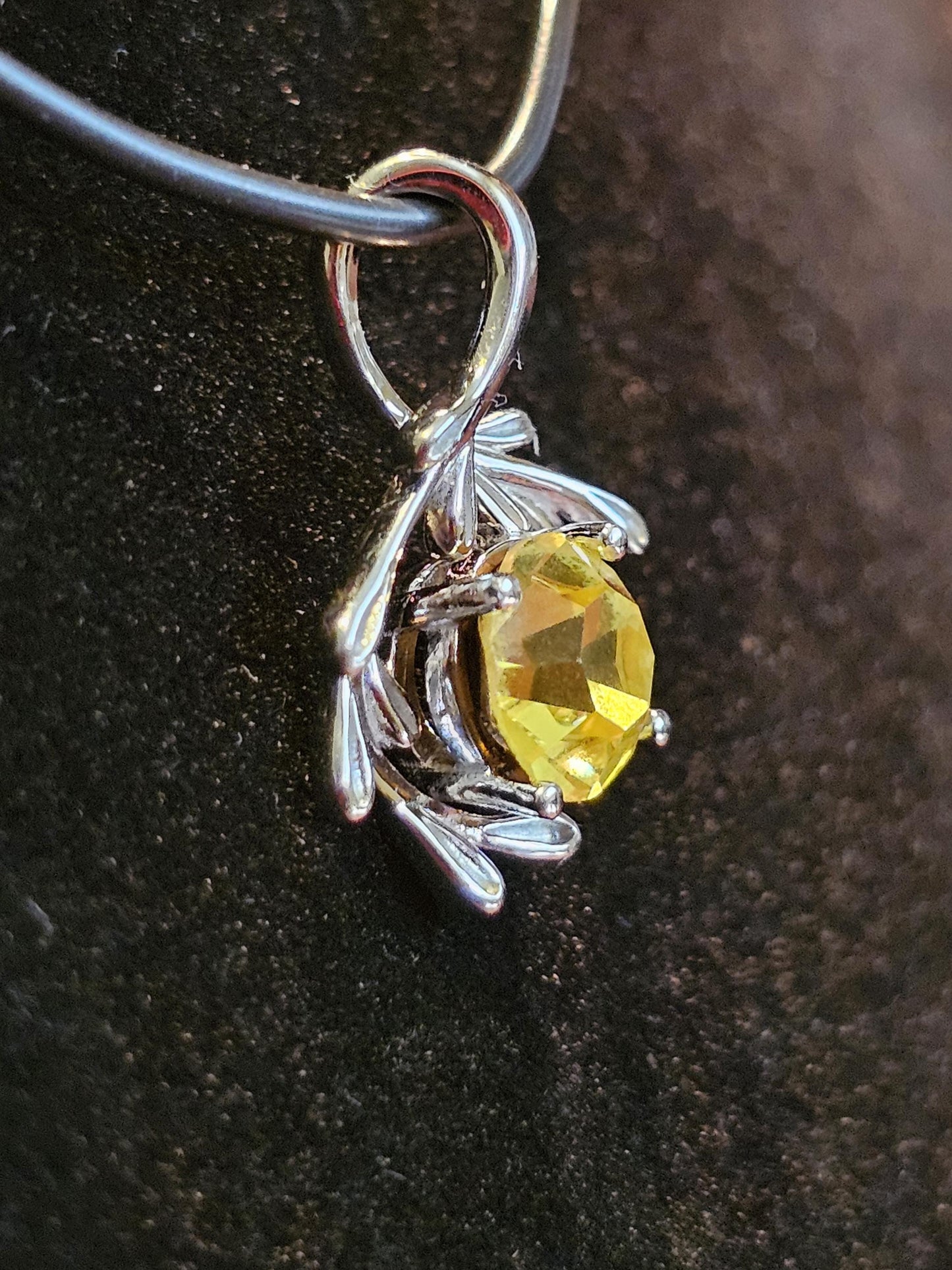 Cadmium Glass Pendant in new Sterling Silver with a vintage Round cut 7 mm Cadmium glass stone that glows under black / UV light