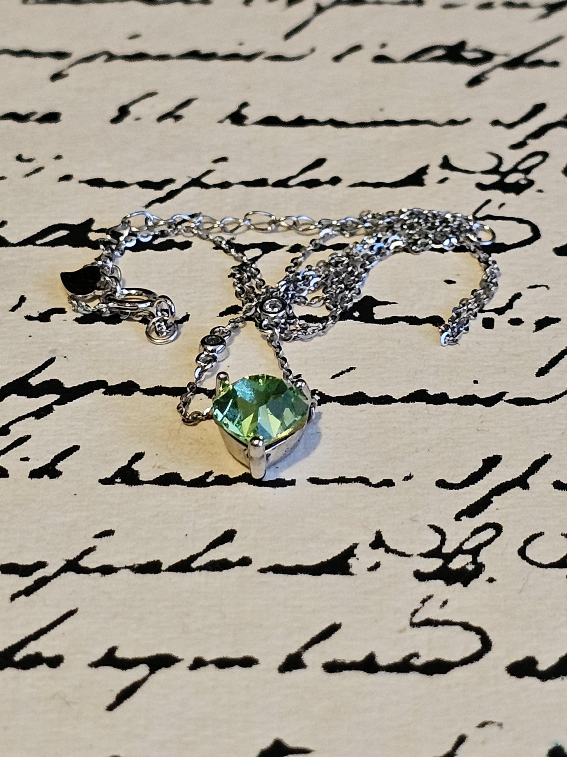 Uranium Glass Pendant w/ necklace, new Sterling Silver, with a vintage 8mm Heart cut Uranium glass stone that glows under black/UV light