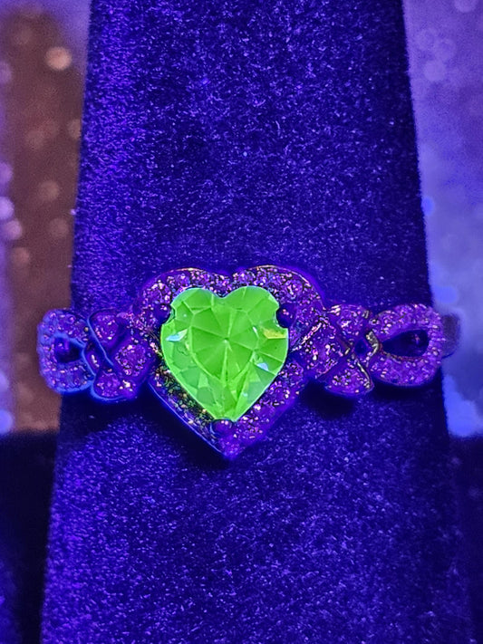 Uranium Glass Adjustable sized Ring in new Sterling Silver with a vintage Heart cut Uranium glass stone that glows under black / UV light