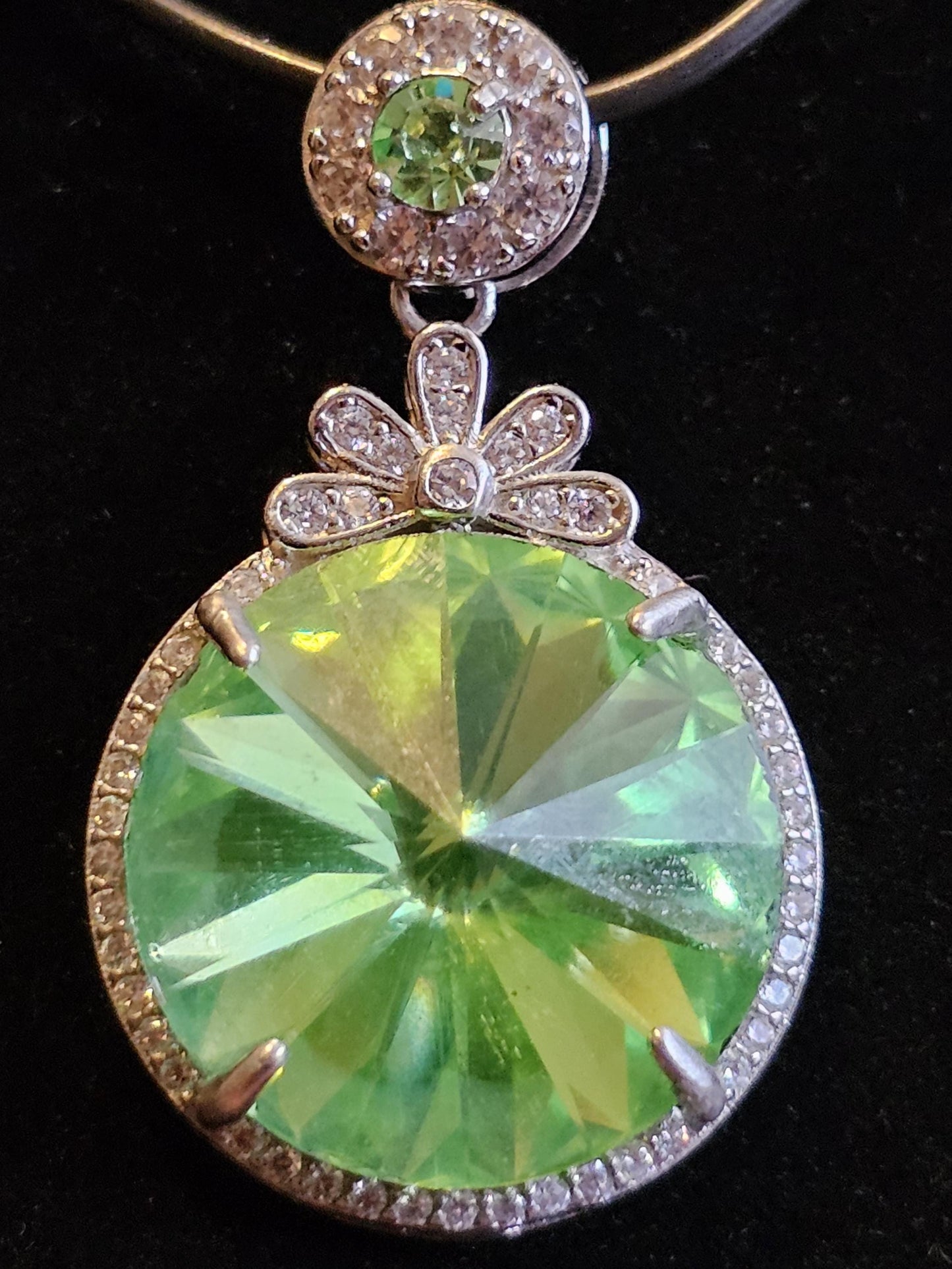 Uranium Glass Pendant new Sterling Silver with a vintage 18 mm Rivolis round cut Uranium Glass stone that glows under black / UV light