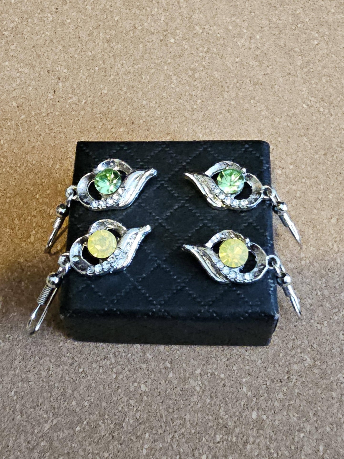Uranium Glass Earrings new Silver plateing with Vintage Round cut 5 mm Uranium Glass stones Green or Yellow that glow under black/UV light