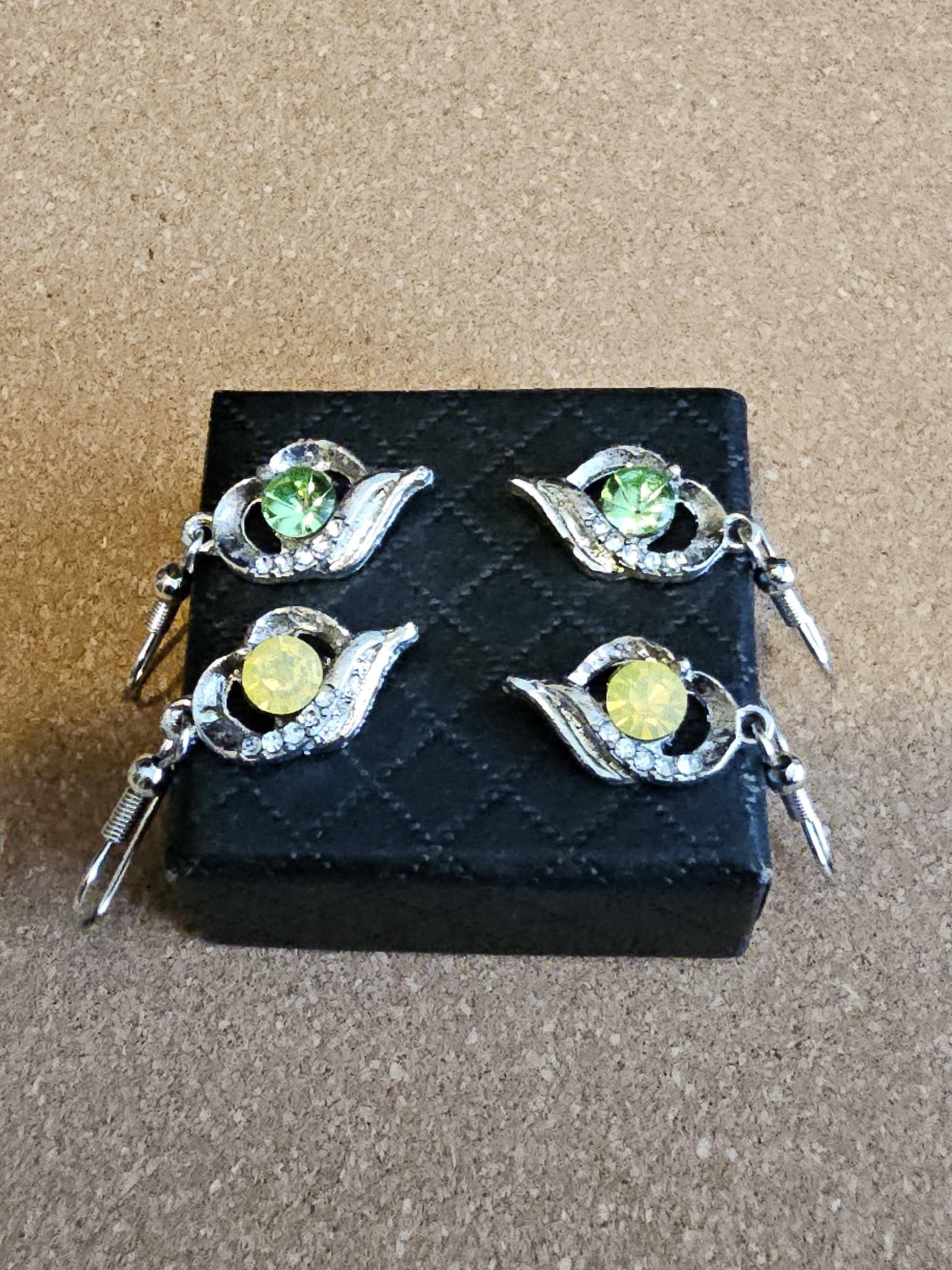 Uranium Glass Earrings new Silver plateing with Vintage Round cut 5 mm Uranium Glass stones Green or Yellow that glow under black/UV light