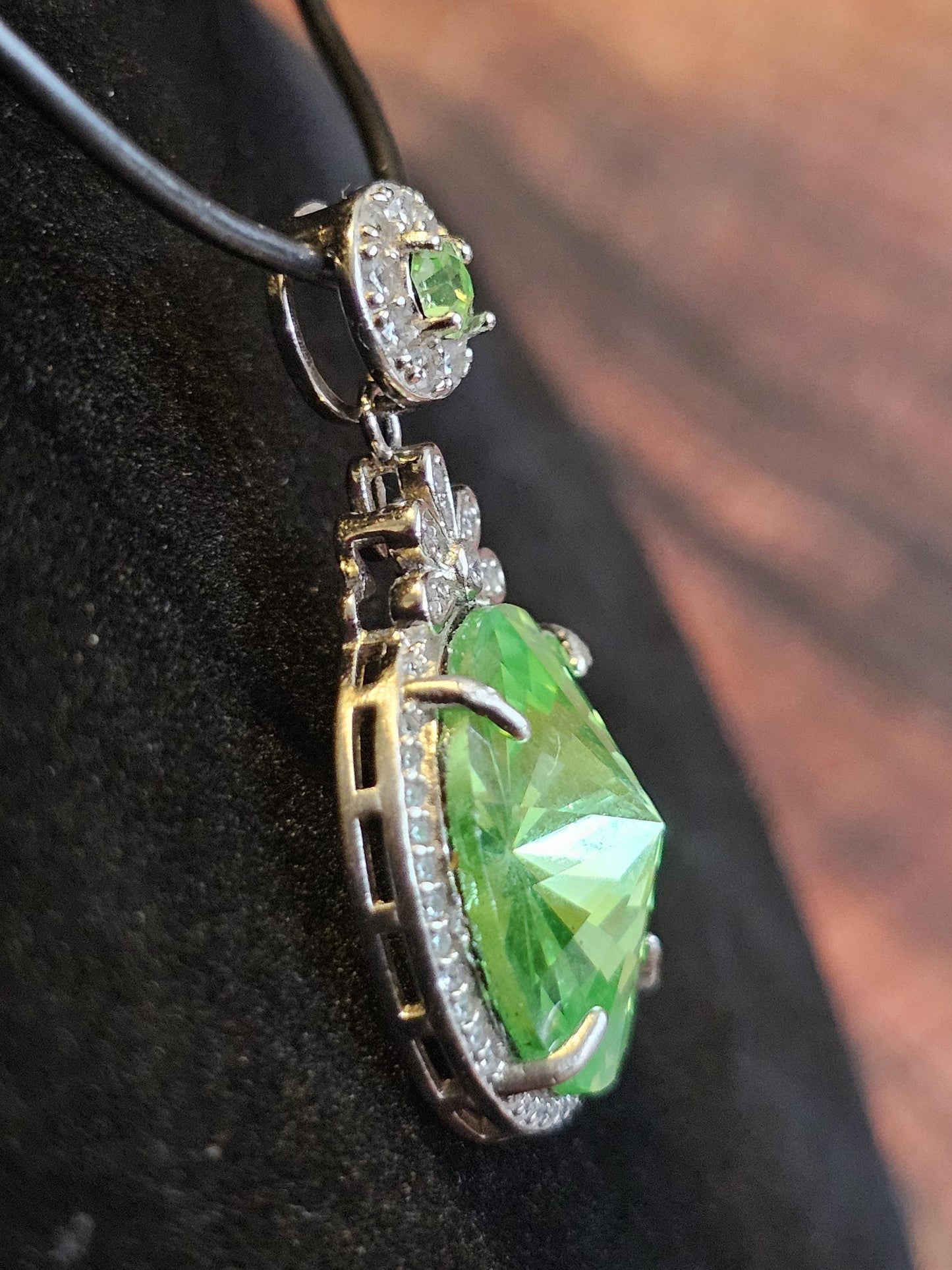 Uranium Glass Pendant new Sterling Silver with a vintage 18 mm Rivolis round cut Uranium Glass stone that glows under black / UV light