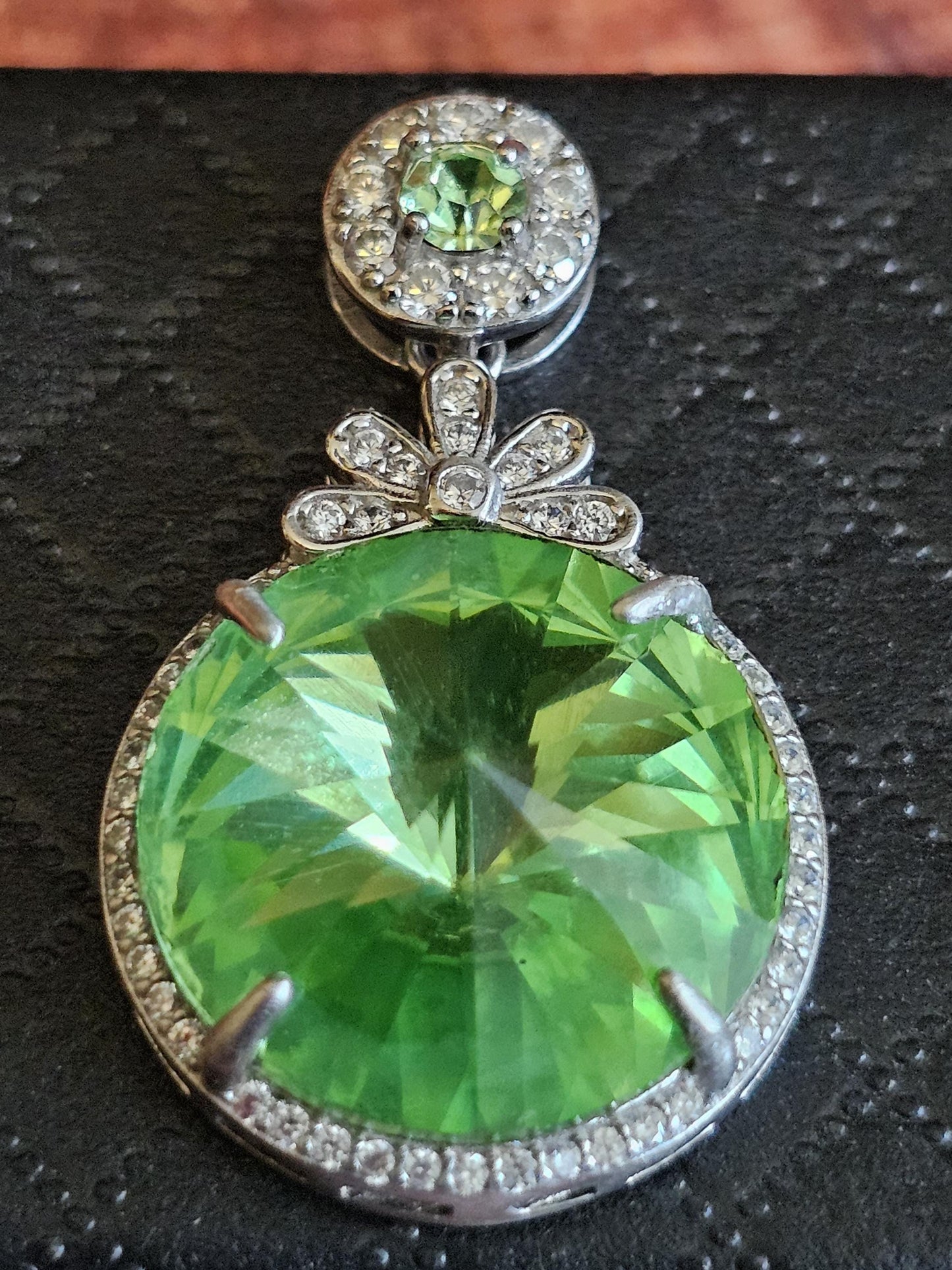 Uranium Glass Pendant new Sterling Silver with a vintage 18 mm Rivolis round cut Uranium Glass stone that glows under black / UV light