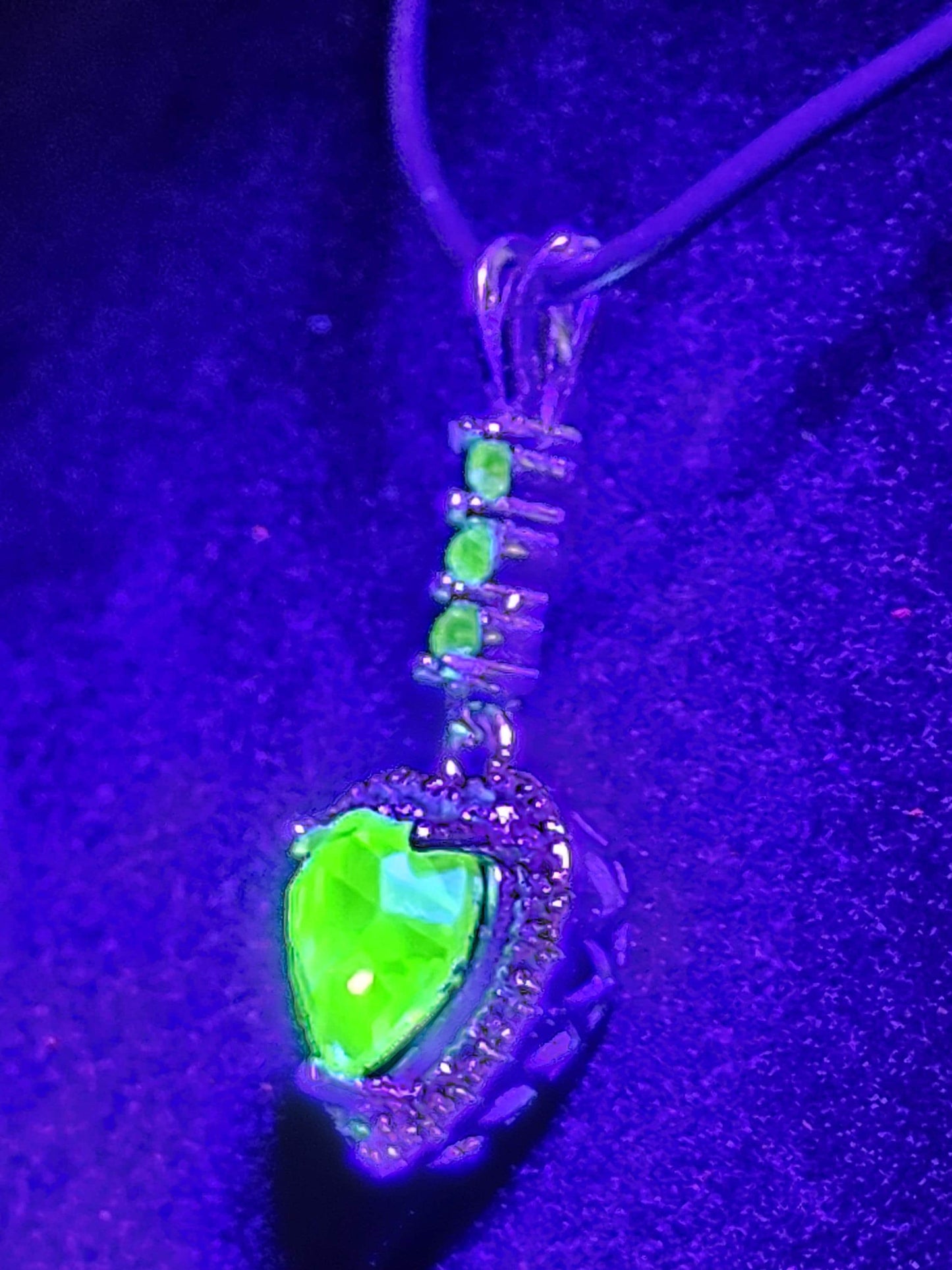 Uranium Glass Pendant in new Sterling Silver setting with 4 vintage Heart and Round cut Uranium Glass stones that glow under black/UV light