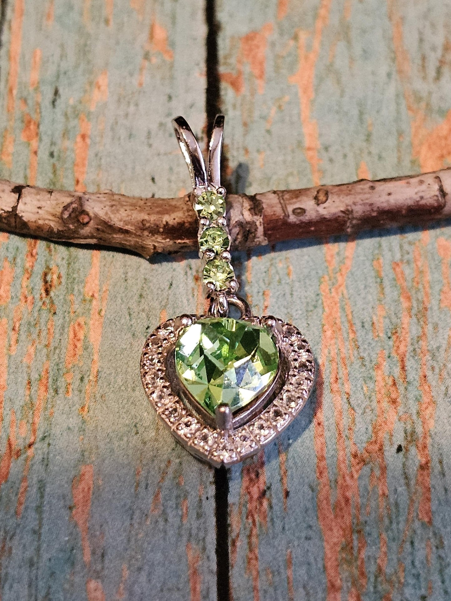 Uranium Glass Pendant in new Sterling Silver setting with 4 vintage Heart and Round cut Uranium Glass stones that glow under black/UV light