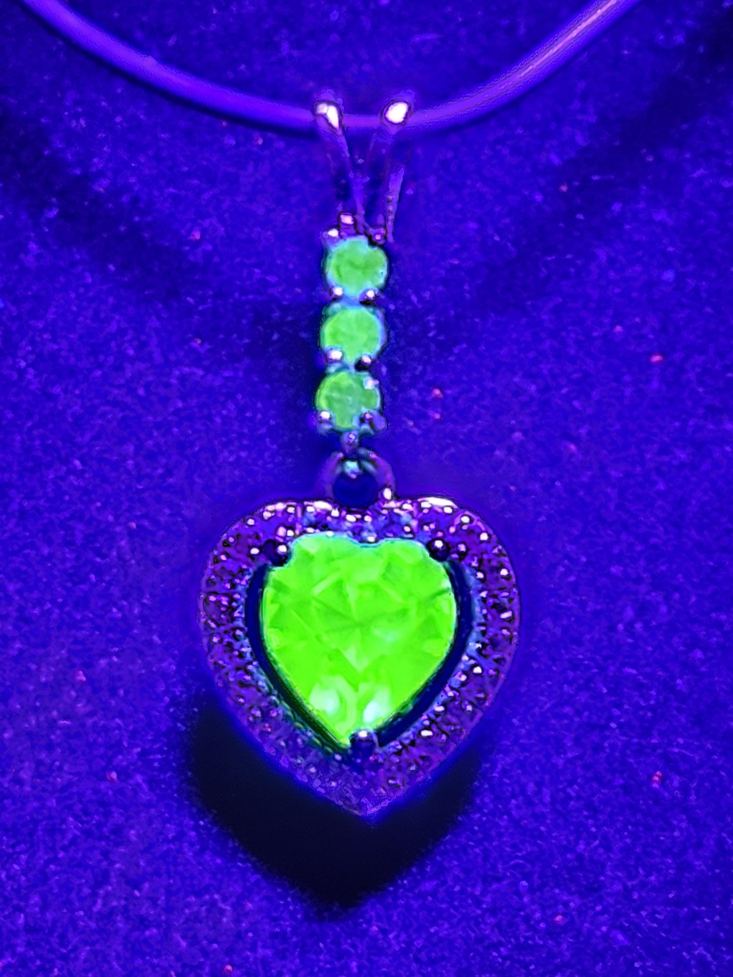 Uranium Glass Pendant in new Sterling Silver setting with 4 vintage Heart and Round cut Uranium Glass stones that glow under black/UV light
