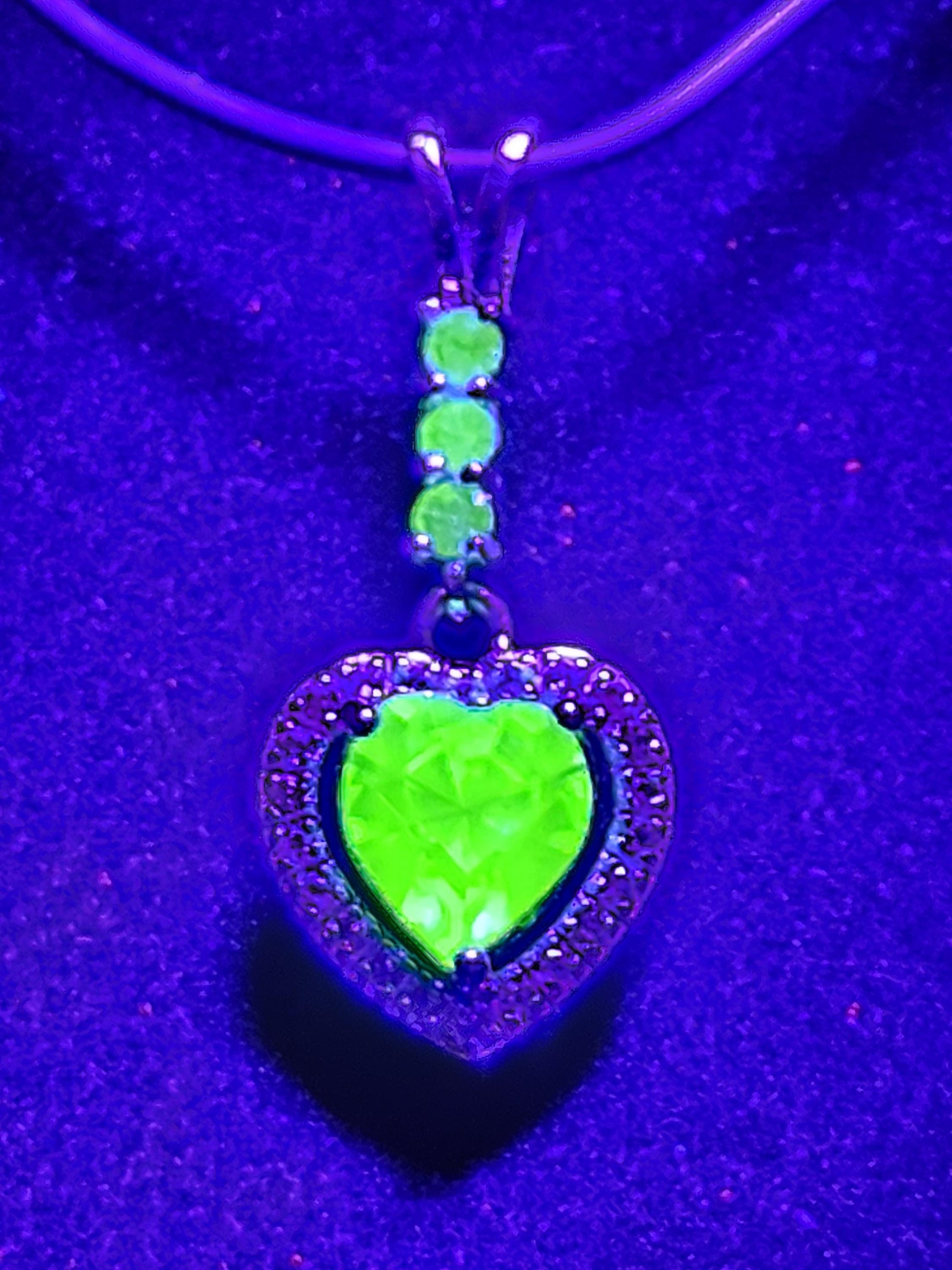 Uranium Glass Pendant in new Sterling Silver setting with 4 vintage Heart and Round cut Uranium Glass stones that glow under black/UV light