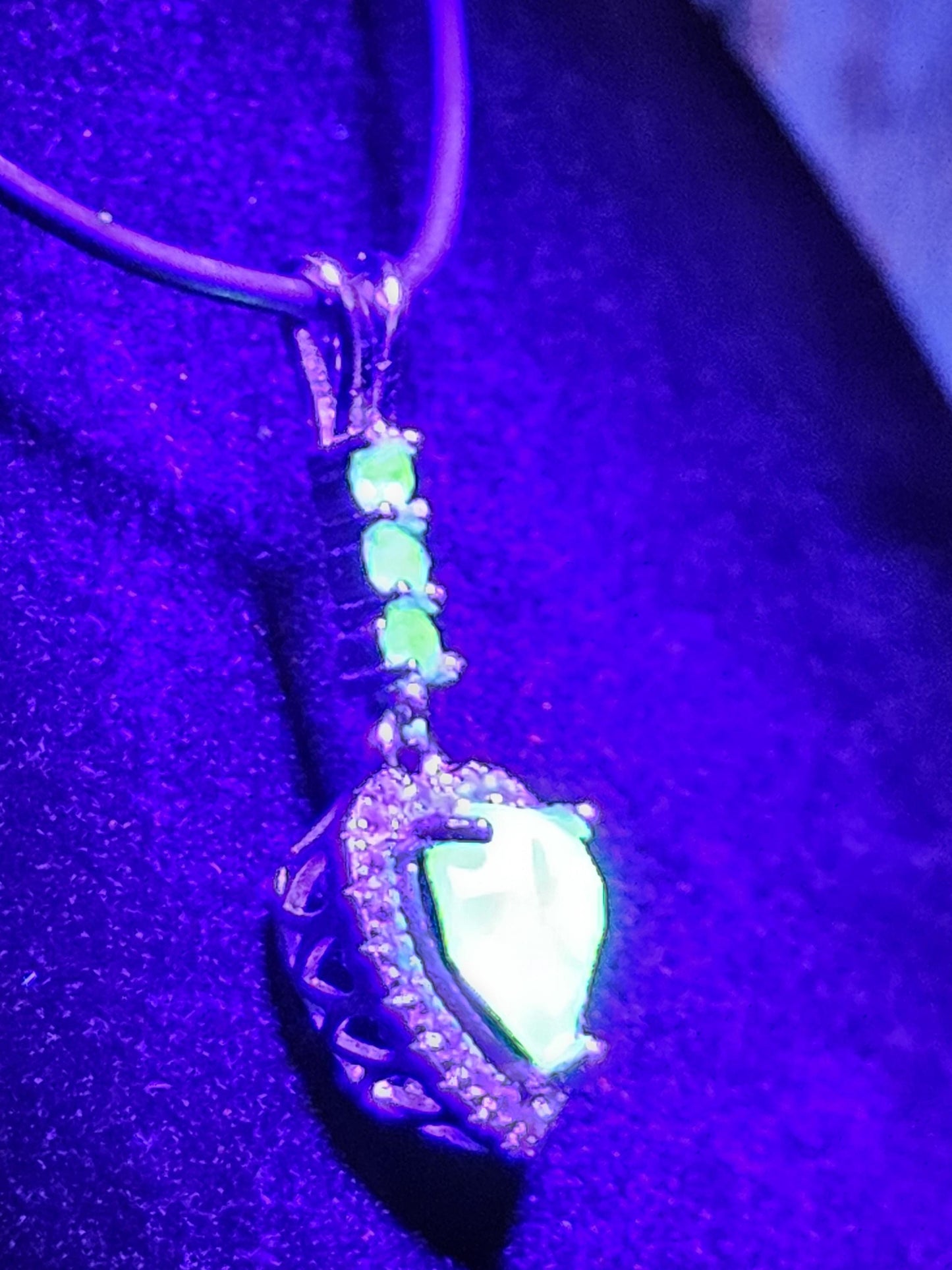 Uranium Glass Pendant in new Sterling Silver setting with 4 vintage Heart and Round cut Uranium Glass stones that glow under black/UV light
