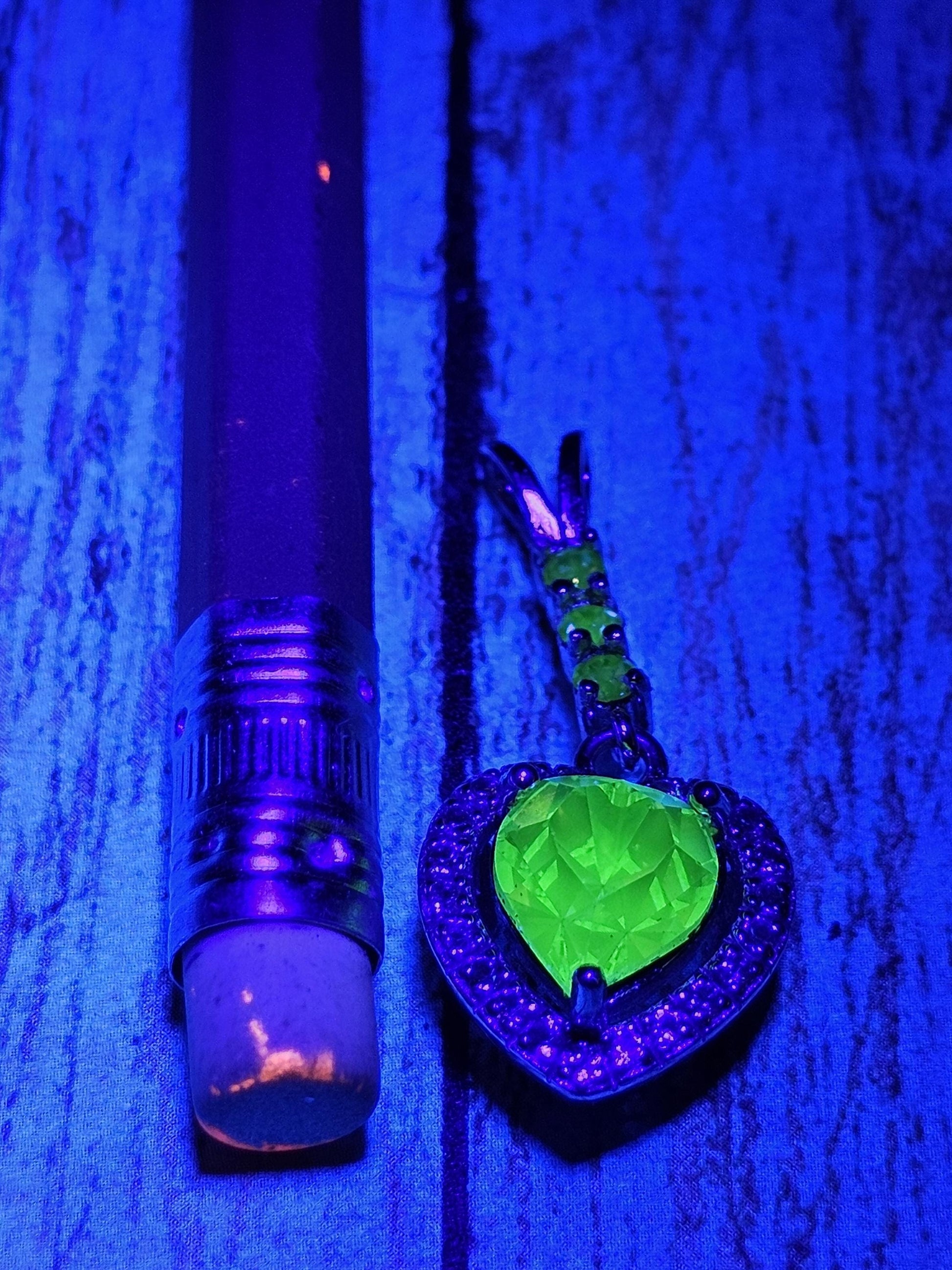 Uranium Glass Pendant in new Sterling Silver setting with 4 vintage Heart and Round cut Uranium Glass stones that glow under black/UV light