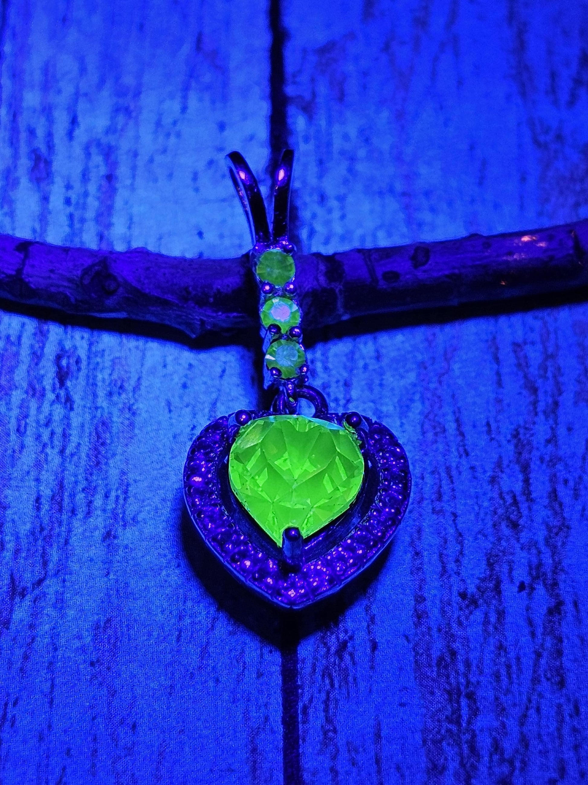 Uranium Glass Pendant in new Sterling Silver setting with 4 vintage Heart and Round cut Uranium Glass stones that glow under black/UV light