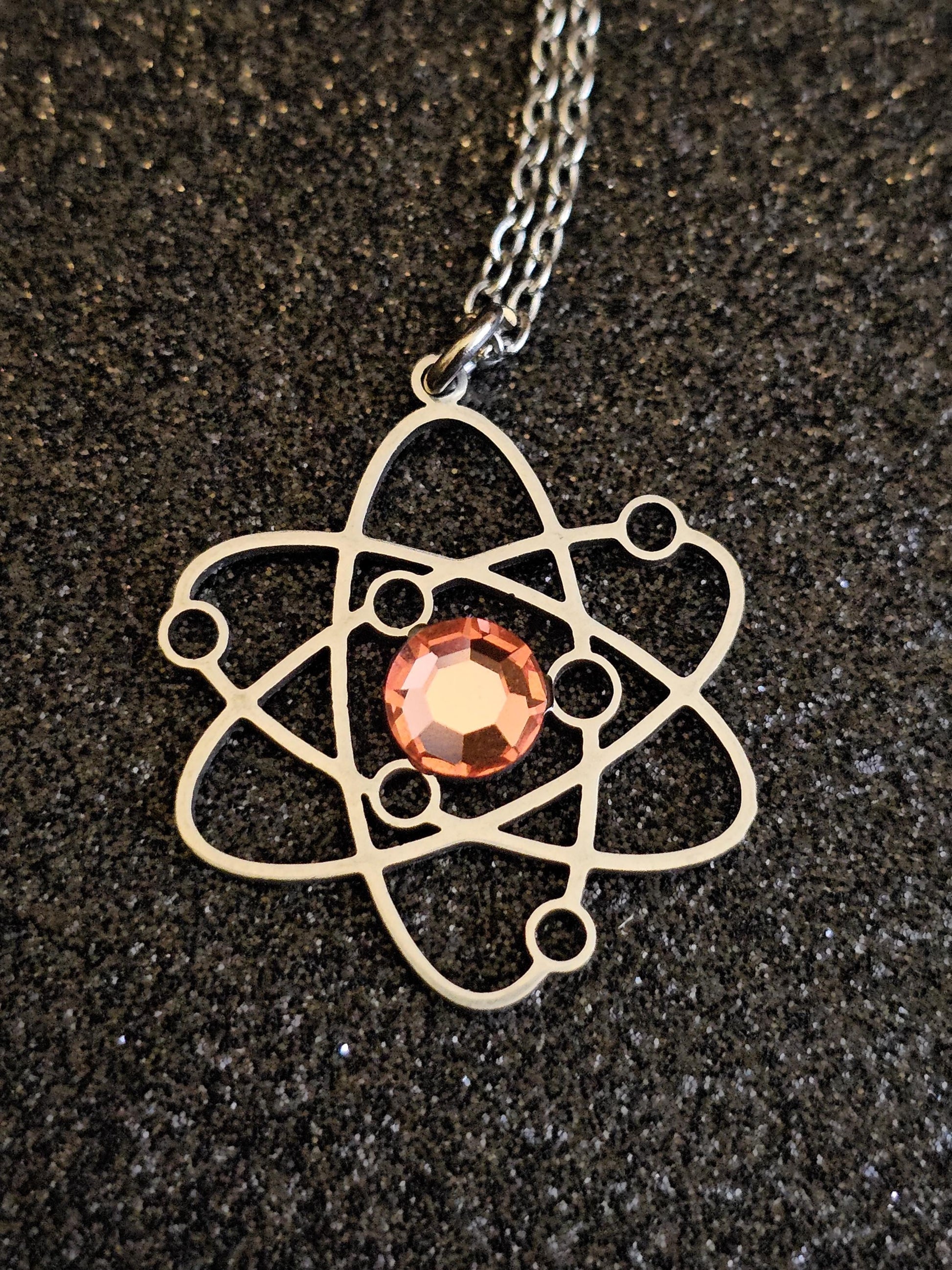 Uranium Glass Pendant in Stainless Steel setting with vintage 6 mm Round cut Cabochon Uranium Glass stone that glows under black / UV light