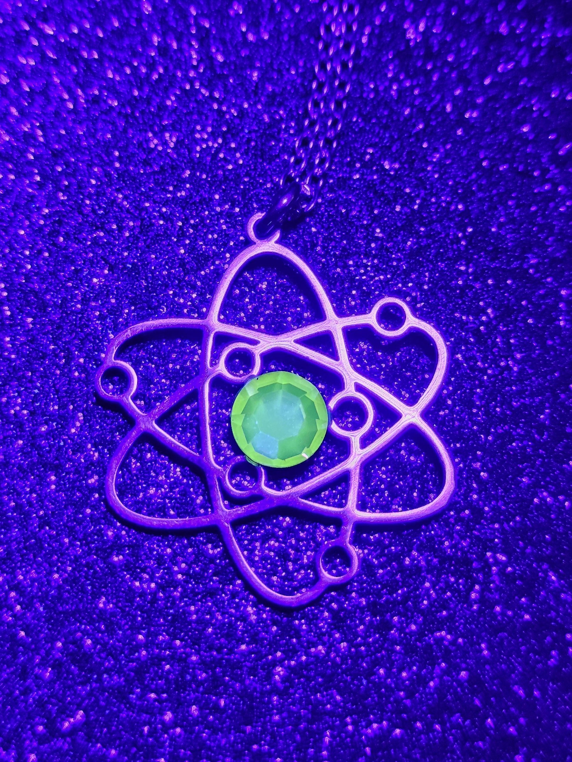 Uranium Glass Pendant in Stainless Steel setting with vintage 6 mm Round cut Cabochon Uranium Glass stone that glows under black / UV light