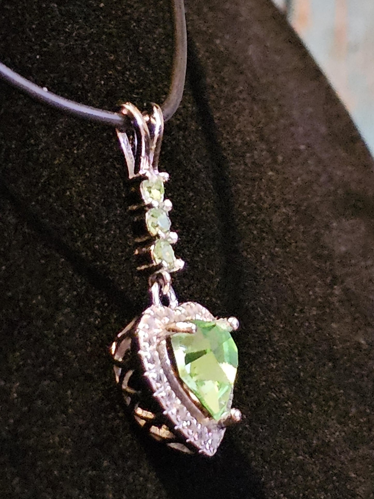 Uranium Glass Pendant in new Sterling Silver setting with 4 vintage Heart and Round cut Uranium Glass stones that glow under black/UV light