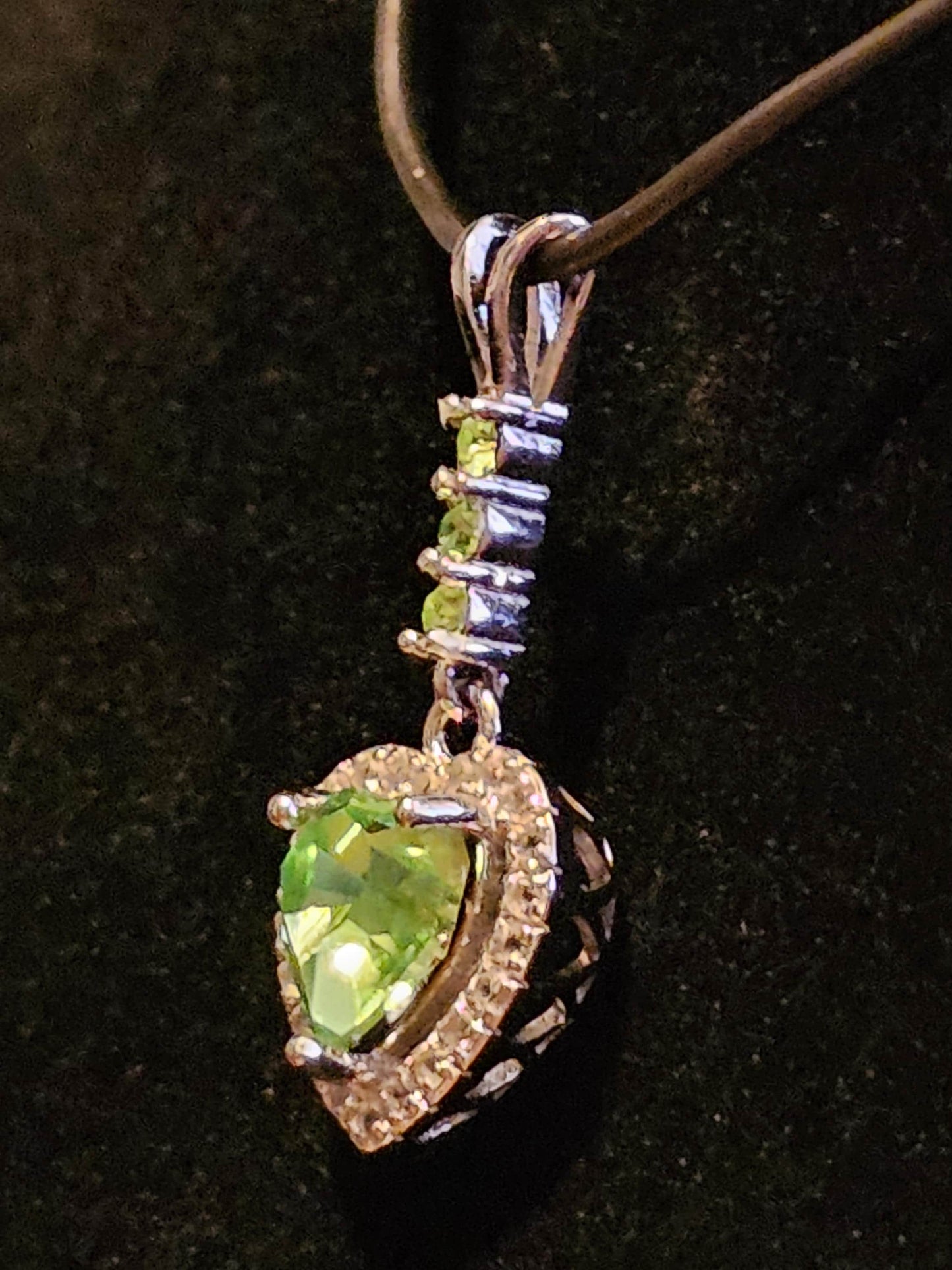 Uranium Glass Pendant in new Sterling Silver setting with 4 vintage Heart and Round cut Uranium Glass stones that glow under black/UV light