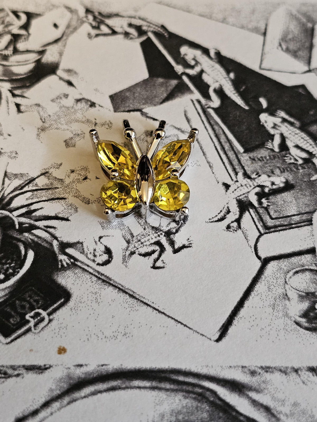 Uranium Glass Pendant in new Sterling Silver Butterfly design with Vintage Uranium Glass stones that glow under black / UV light